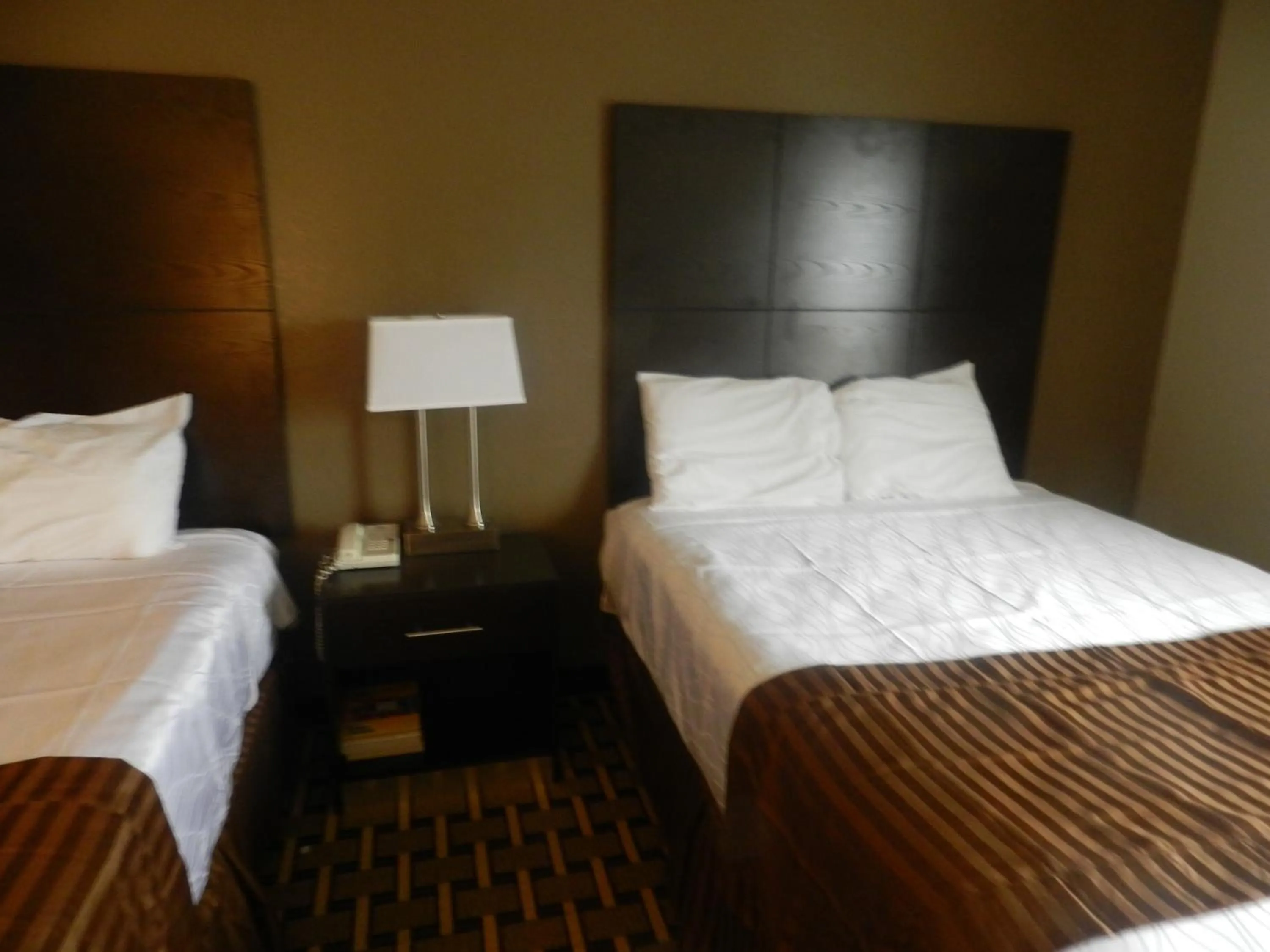 Bed in Haven Inn & Suites