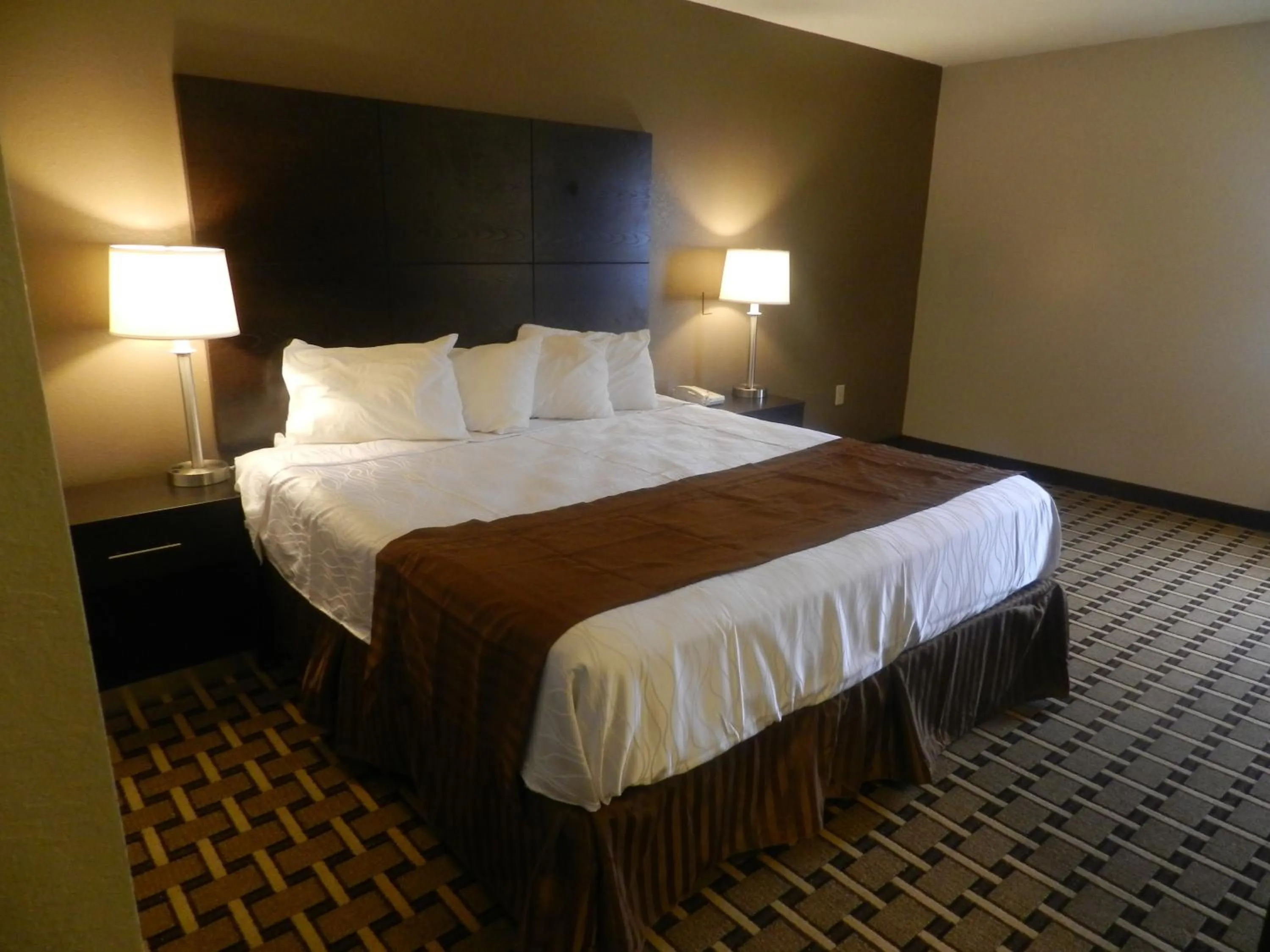 Bed in Haven Inn & Suites