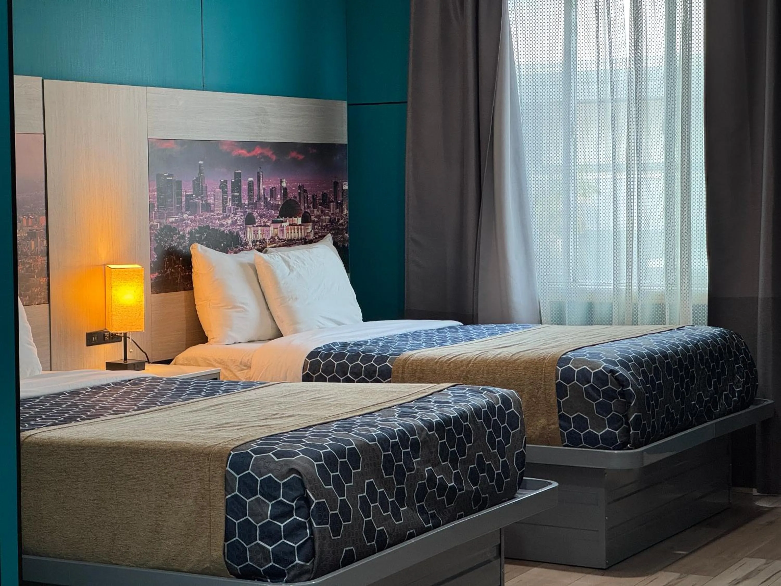 Bed in Hometel Suites