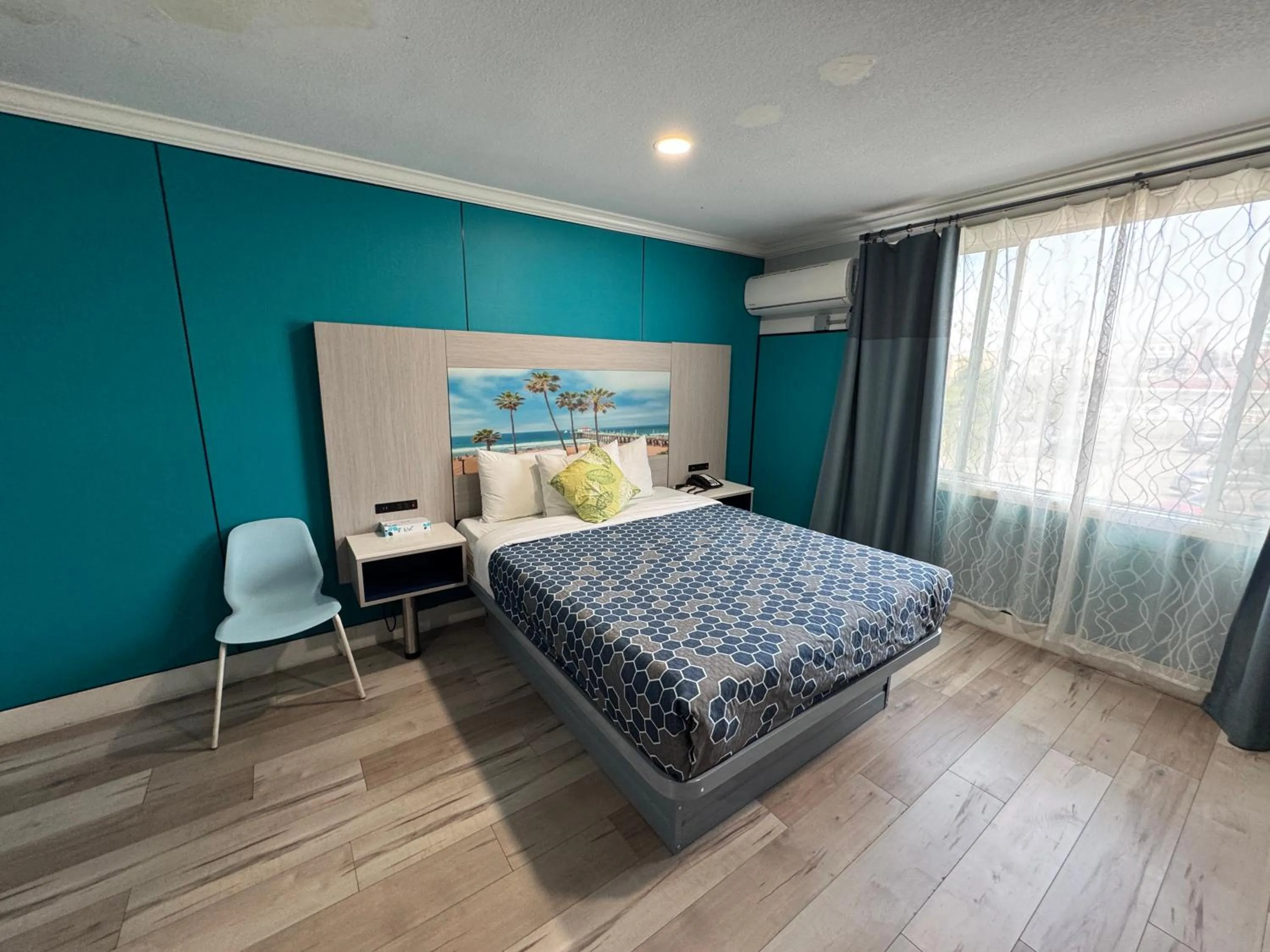 Bed in Hometel Suites