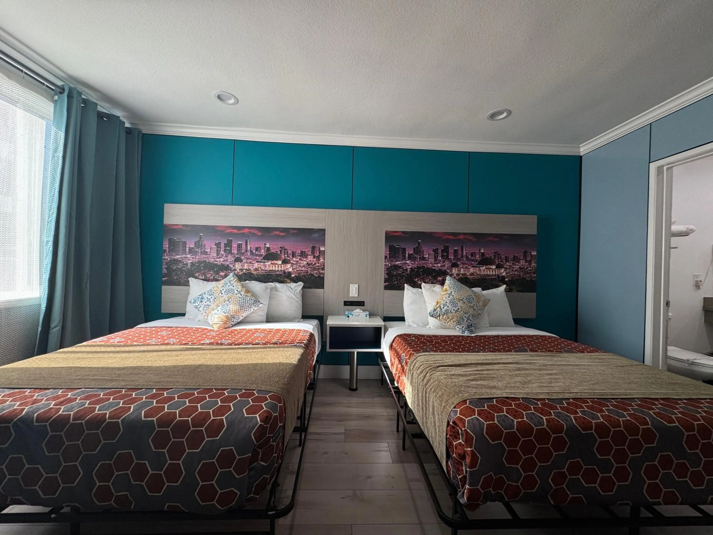 Bed in Hometel Suites