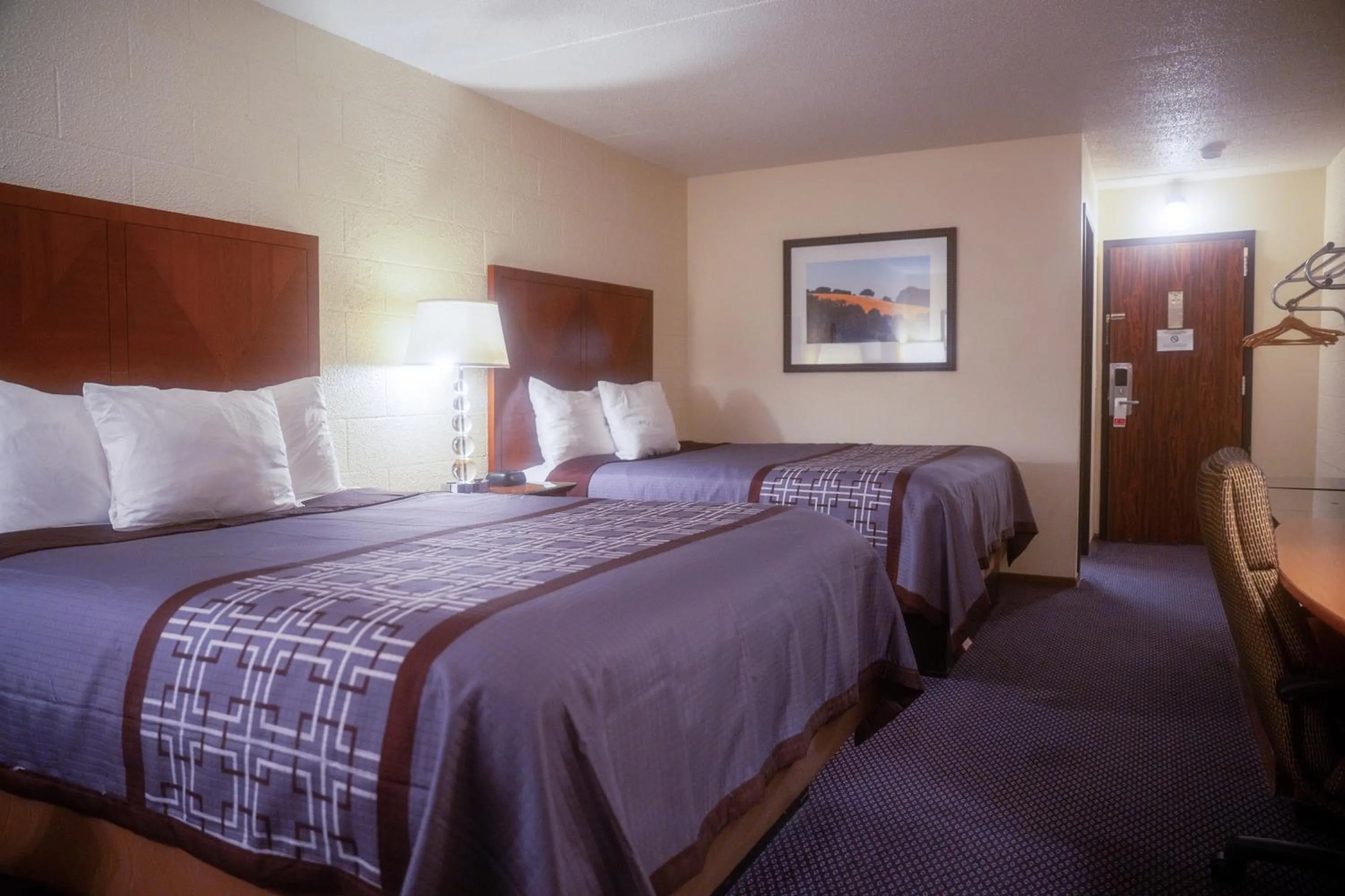 Bedroom in Cedar Inn Motel