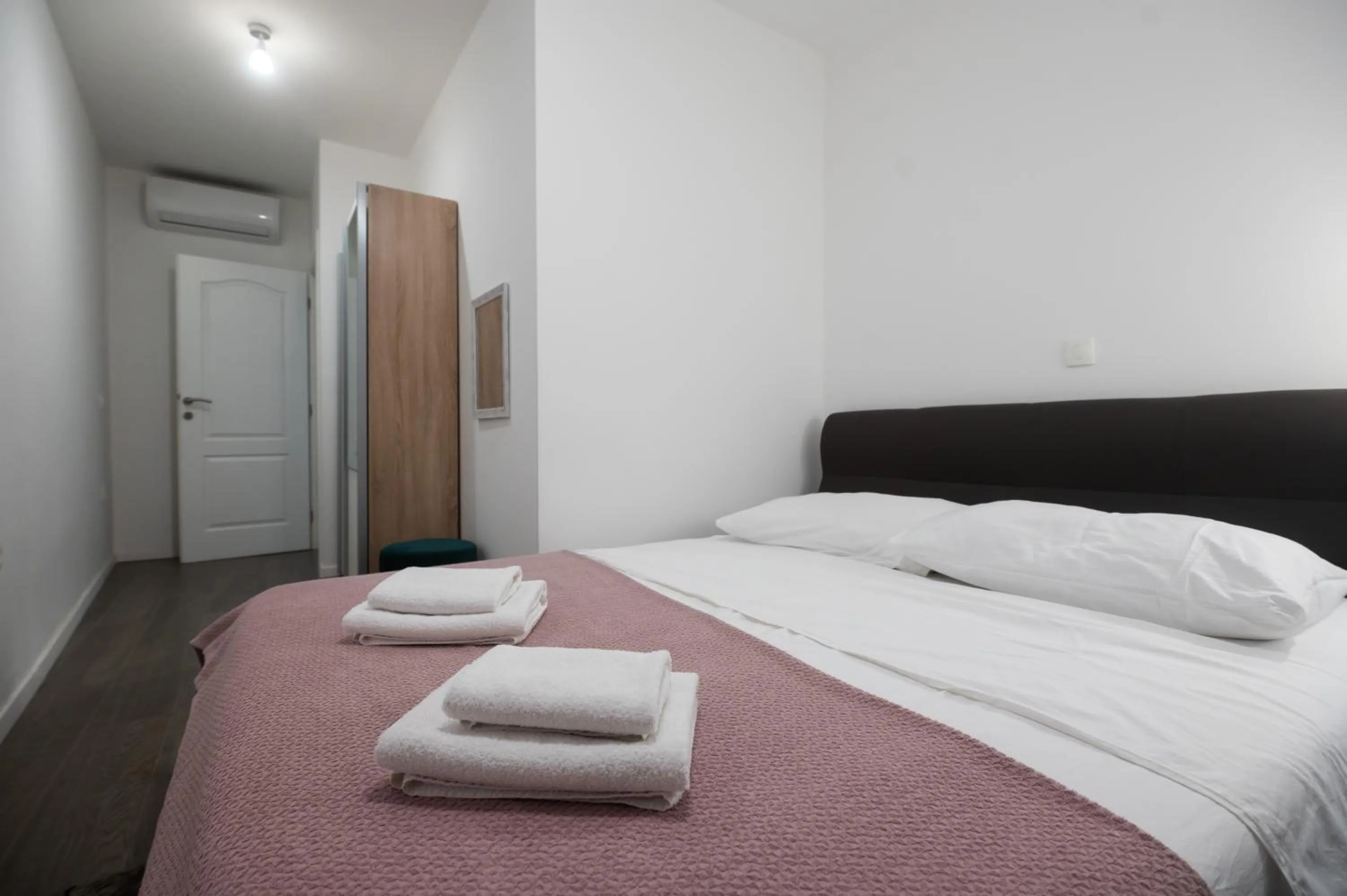 Bed in Pyrotima Apartments