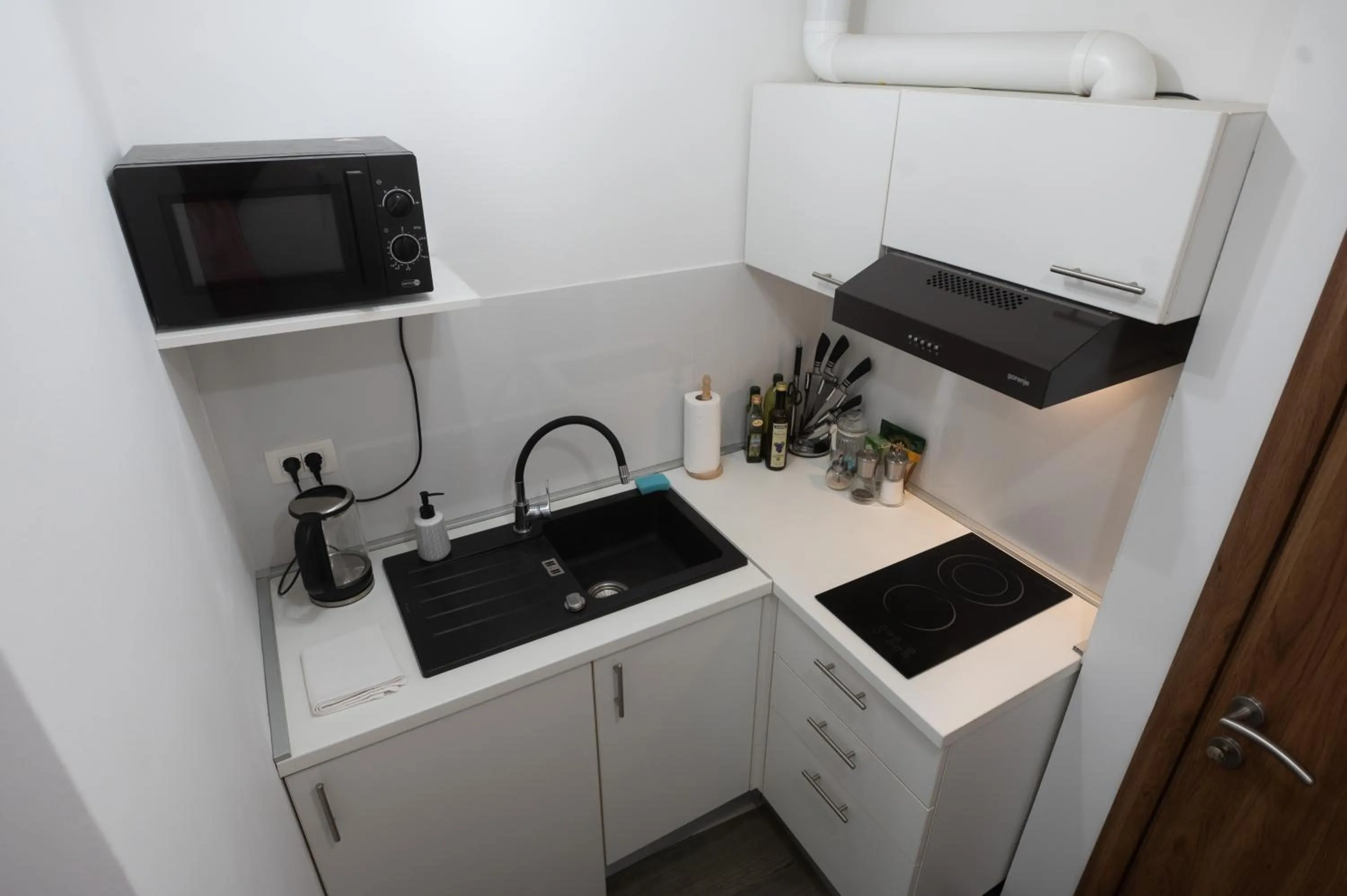 Kitchen or kitchenette in Pyrotima Apartments