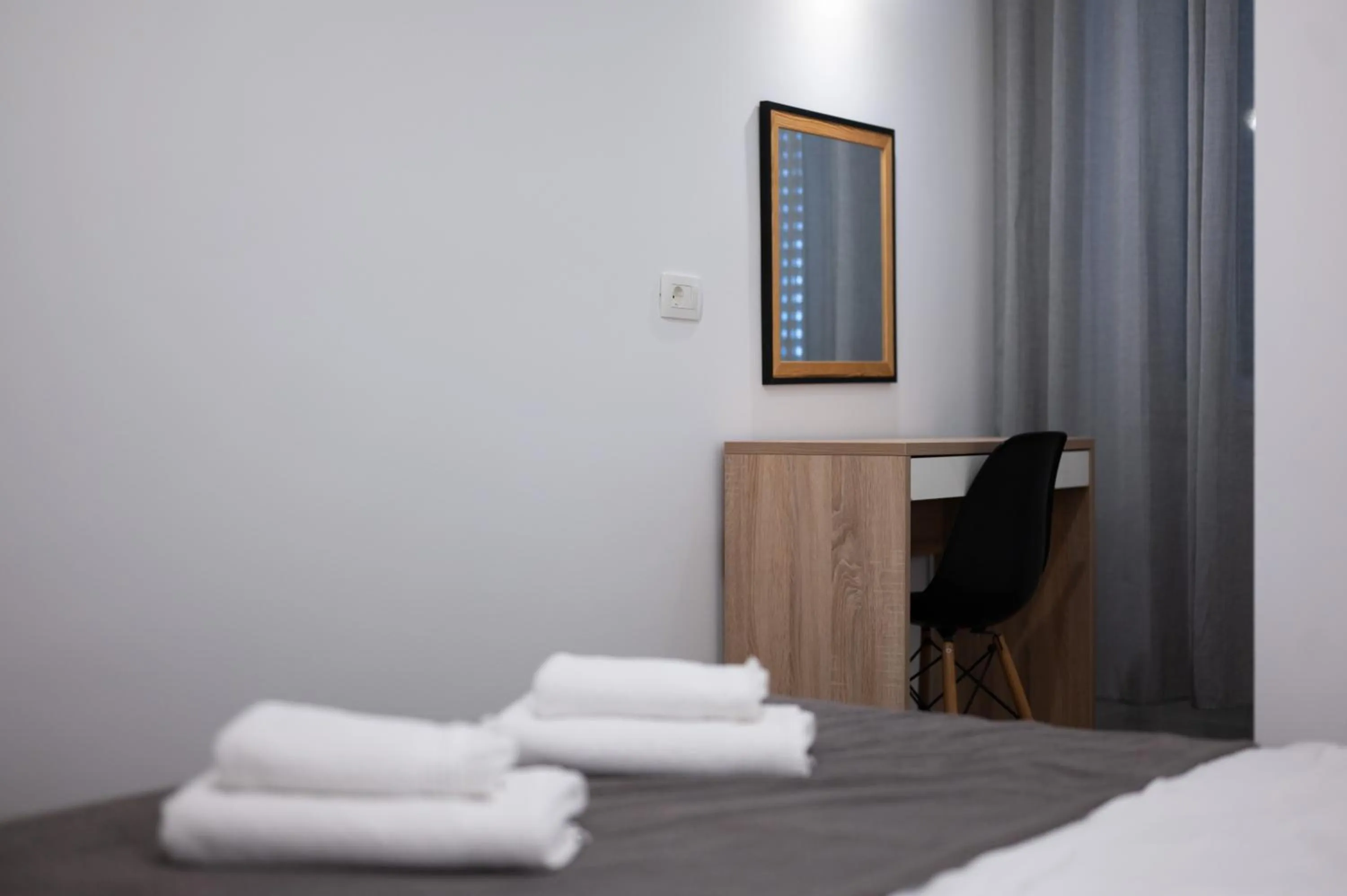 Bed in Pyrotima Apartments