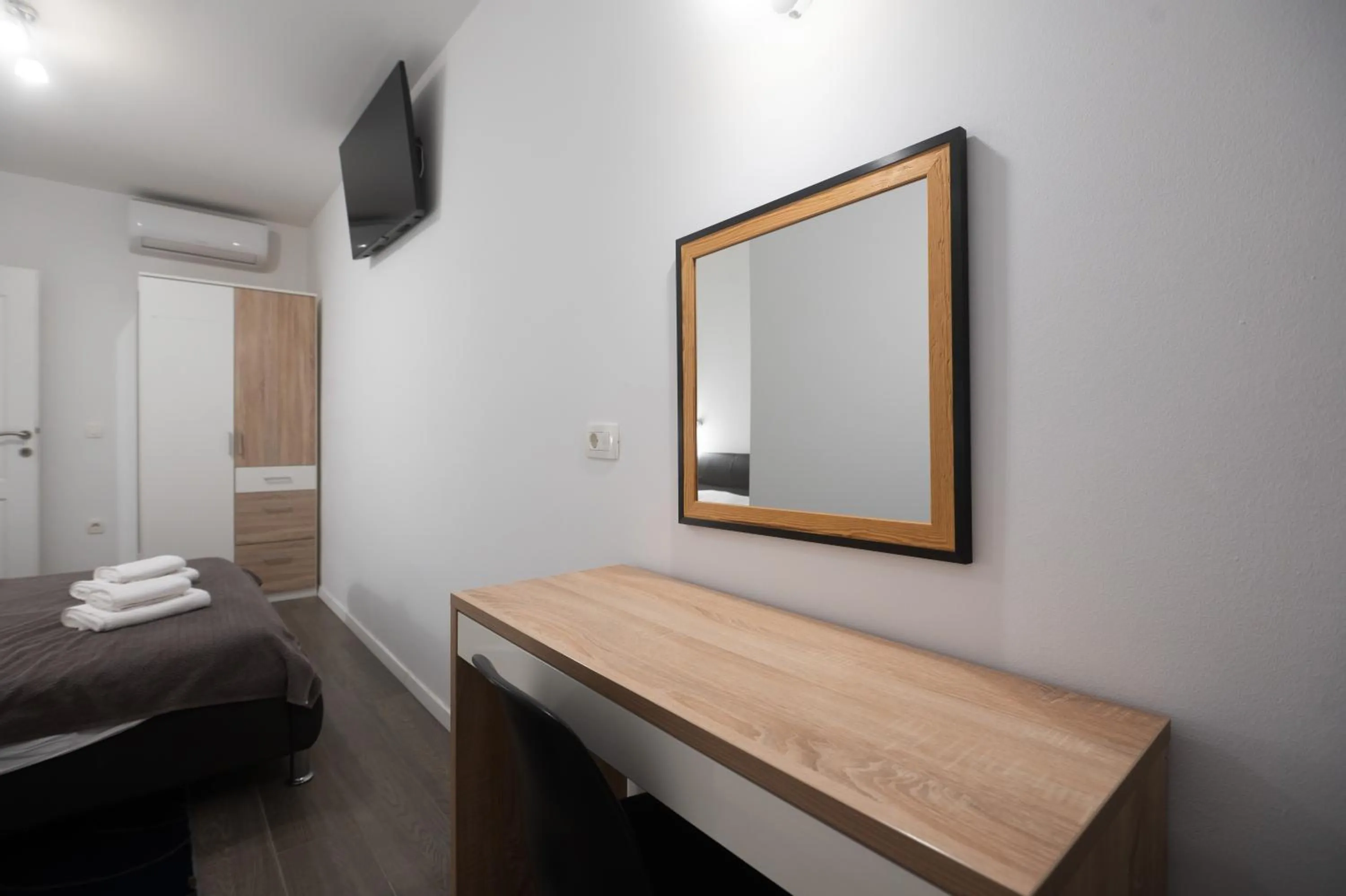 Bed in Pyrotima Apartments