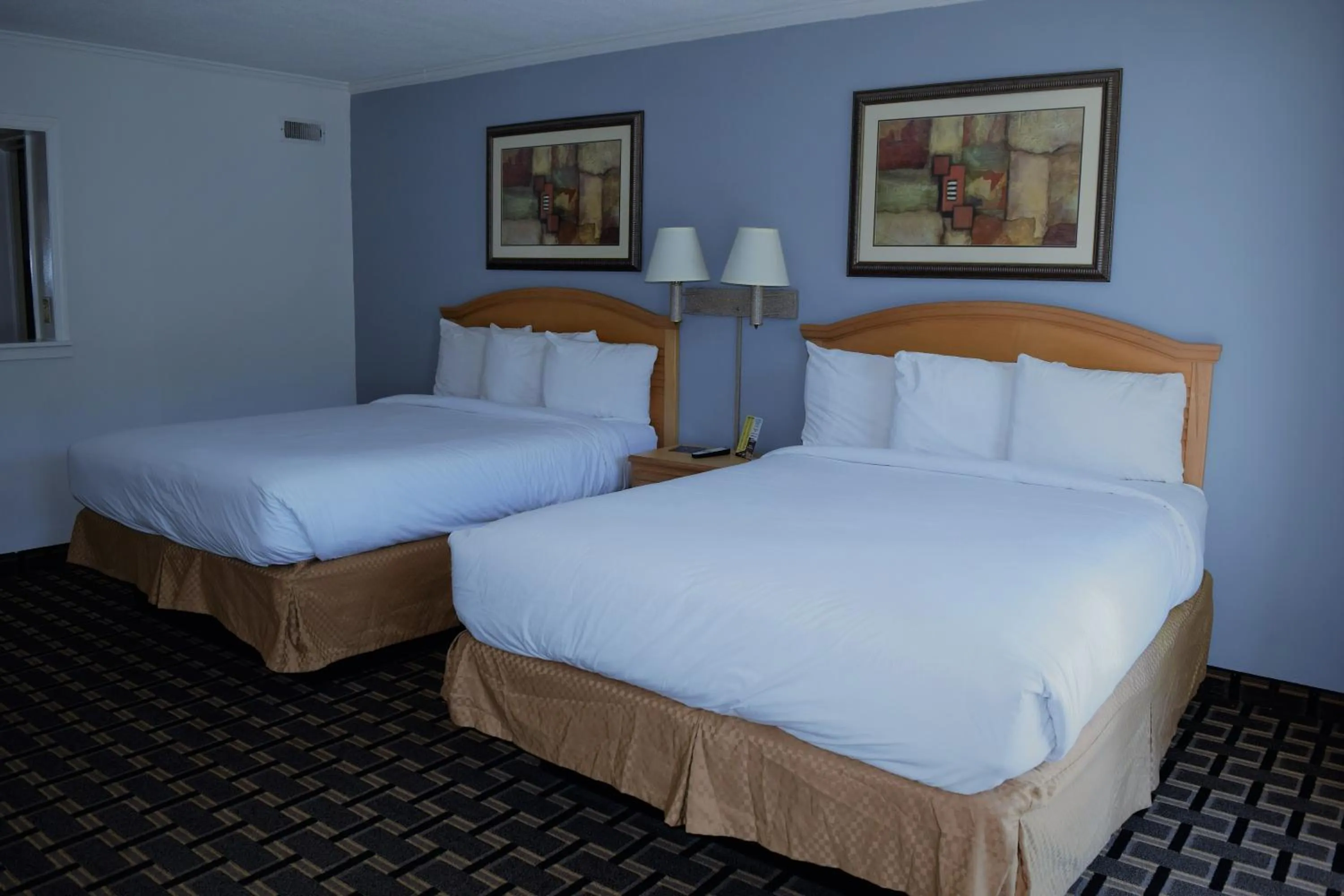 Bed in Budget Inn Conway