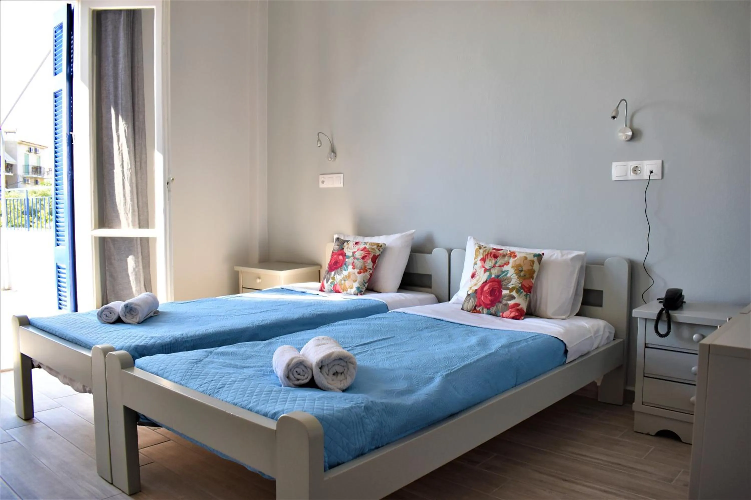 Bed in Aphrodite Art Hotel Aegina