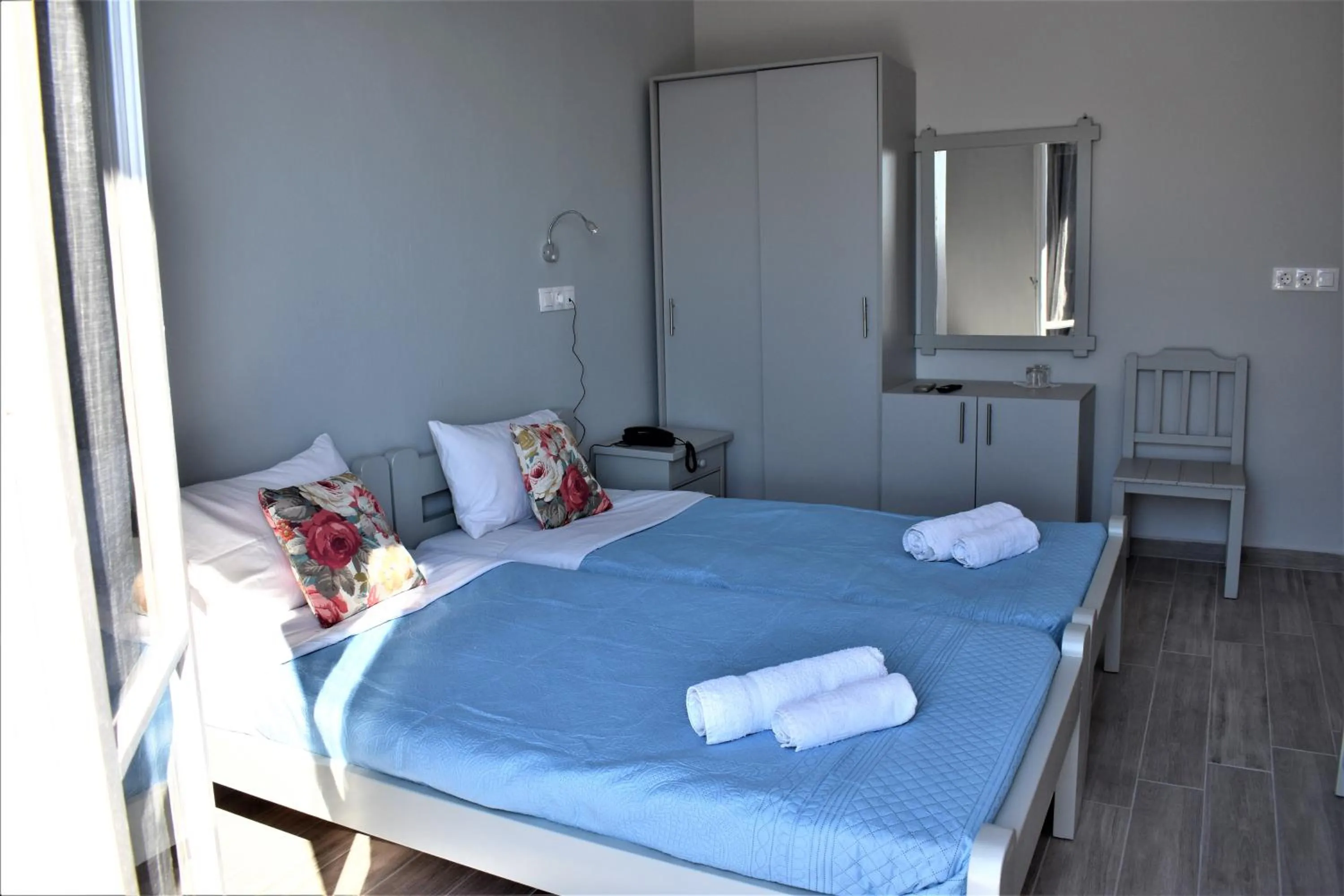 Bed in Aphrodite Art Hotel Aegina
