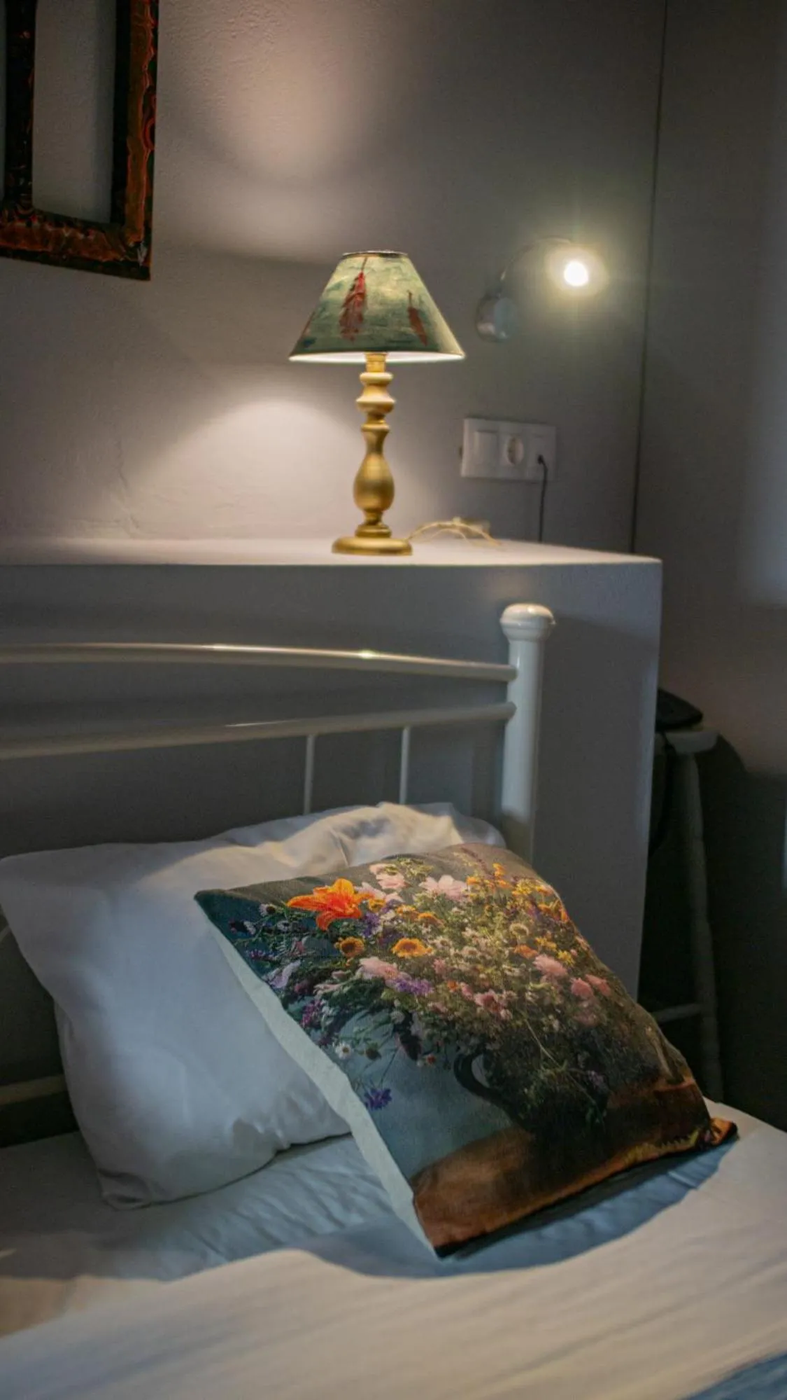 Bed in Aphrodite Art Hotel Aegina