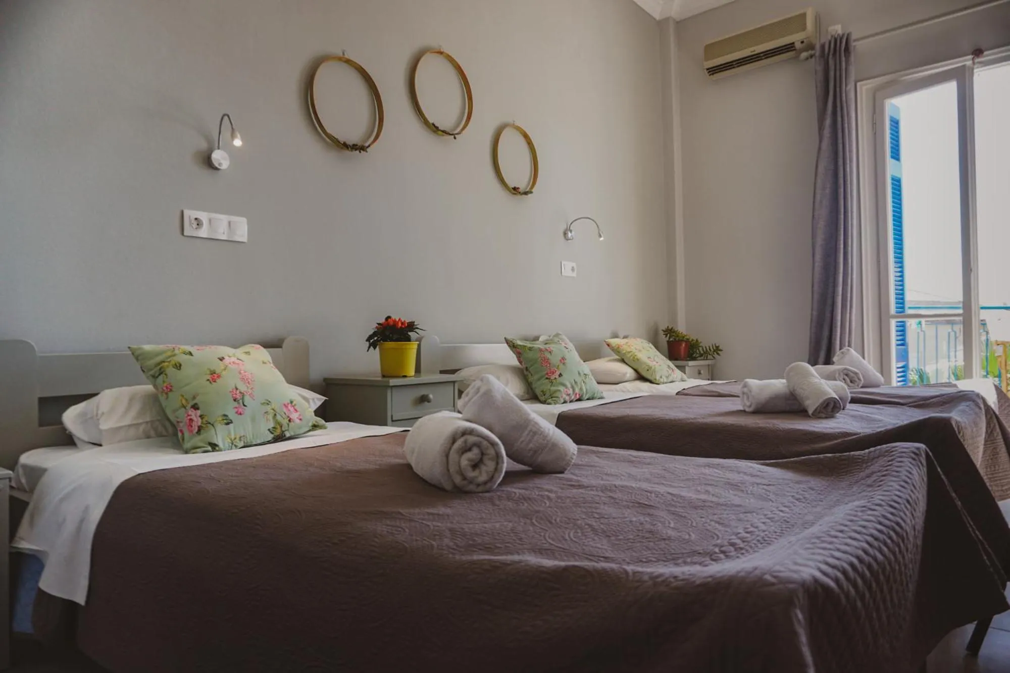 Bed in Aphrodite Art Hotel Aegina