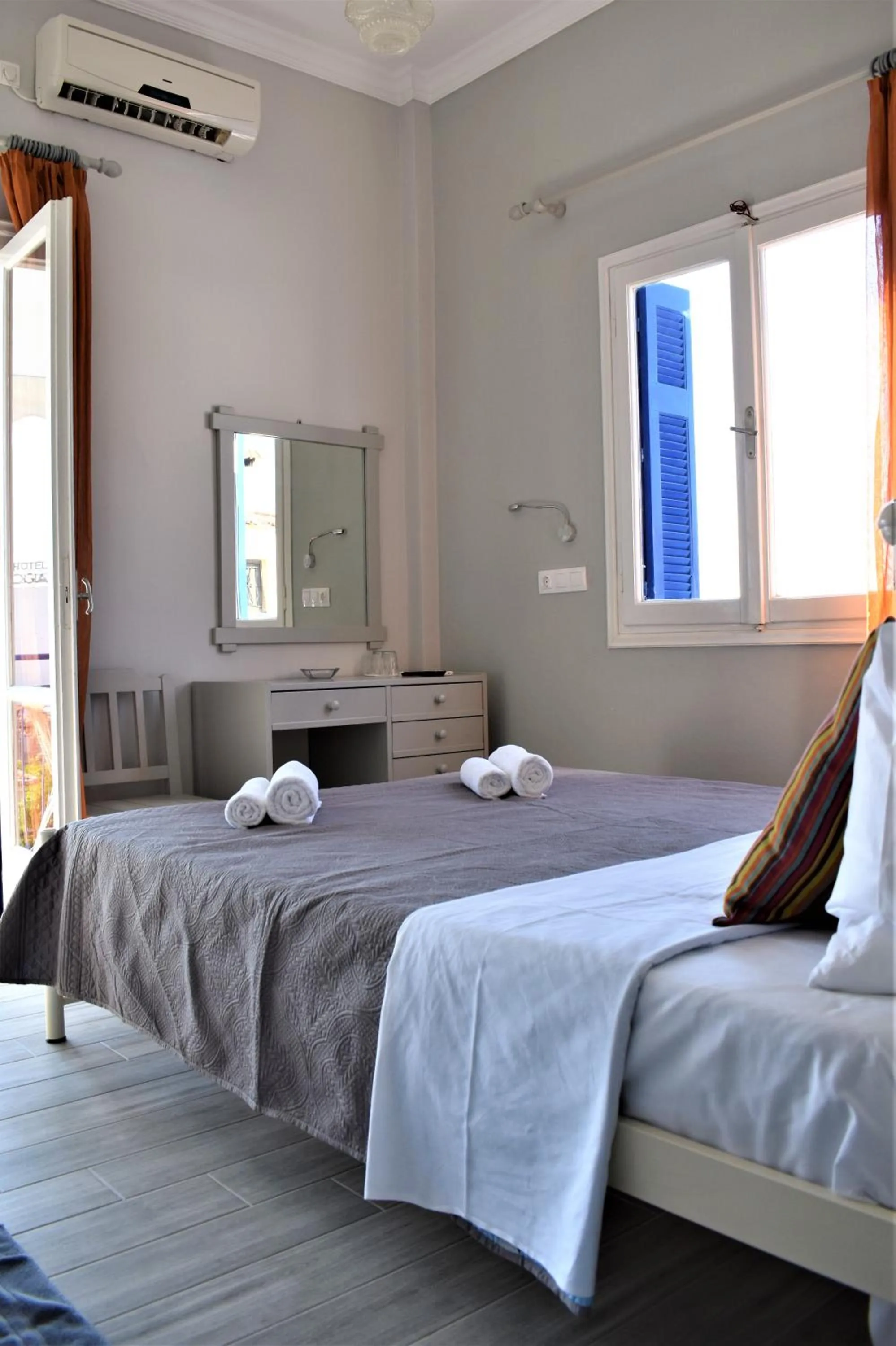 Bed in Aphrodite Art Hotel Aegina
