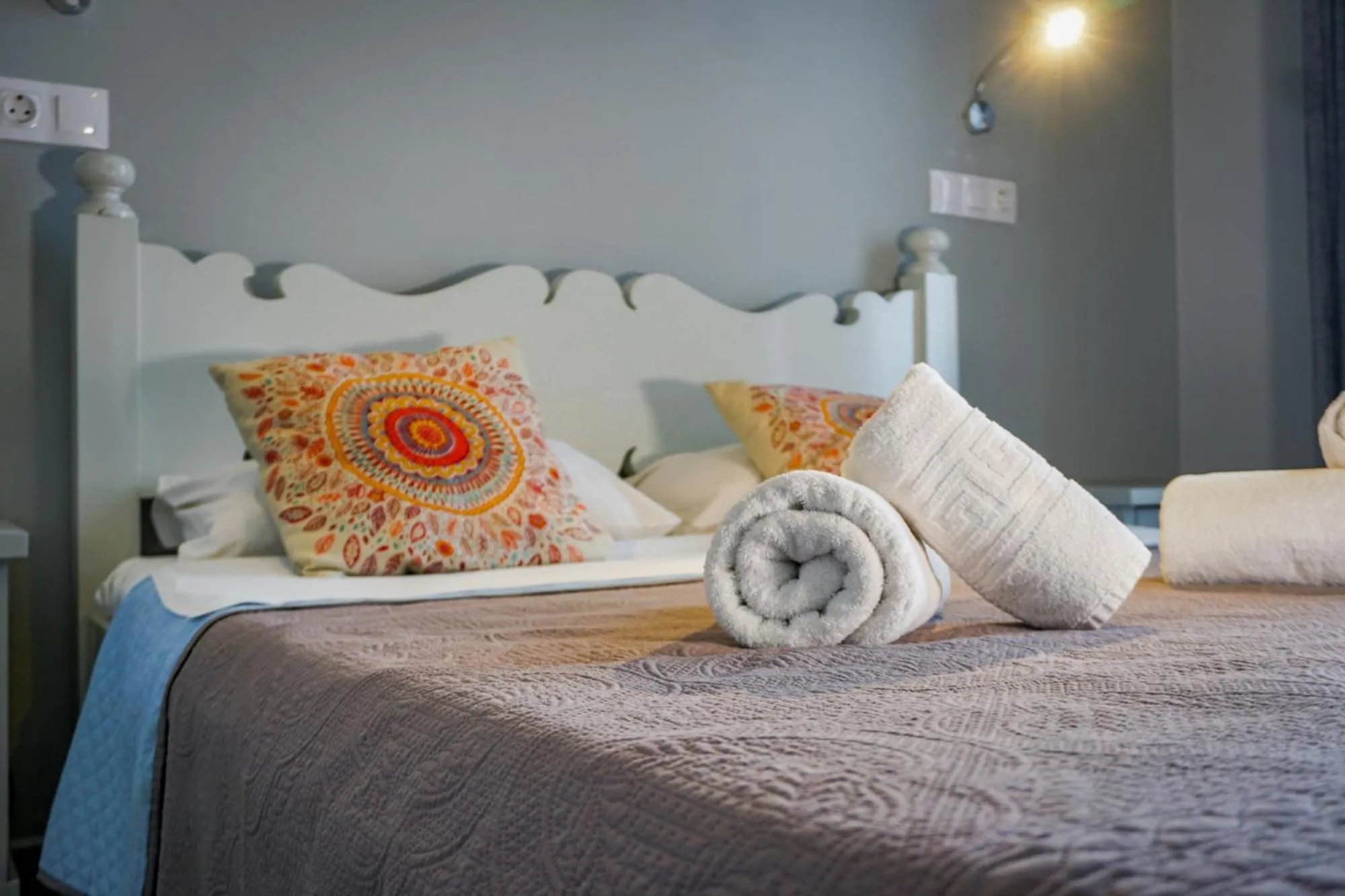 Bed in Aphrodite Art Hotel Aegina