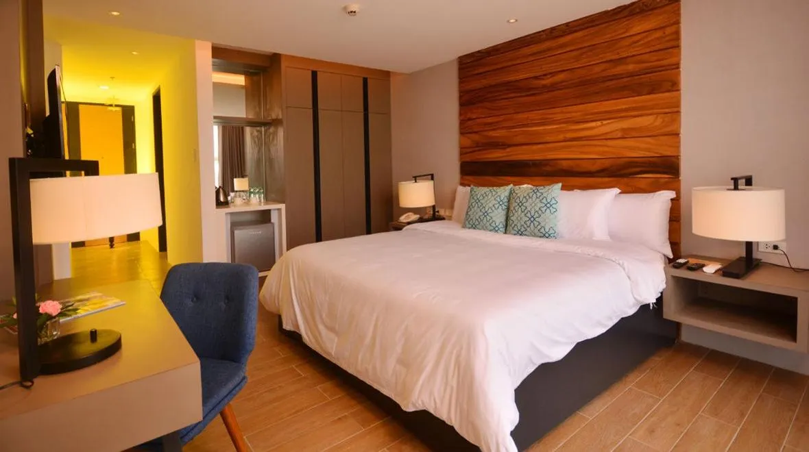 Bedroom, Bed in Crown Hotel at Harbour Springs Palawan Managed by Enderun Hotels