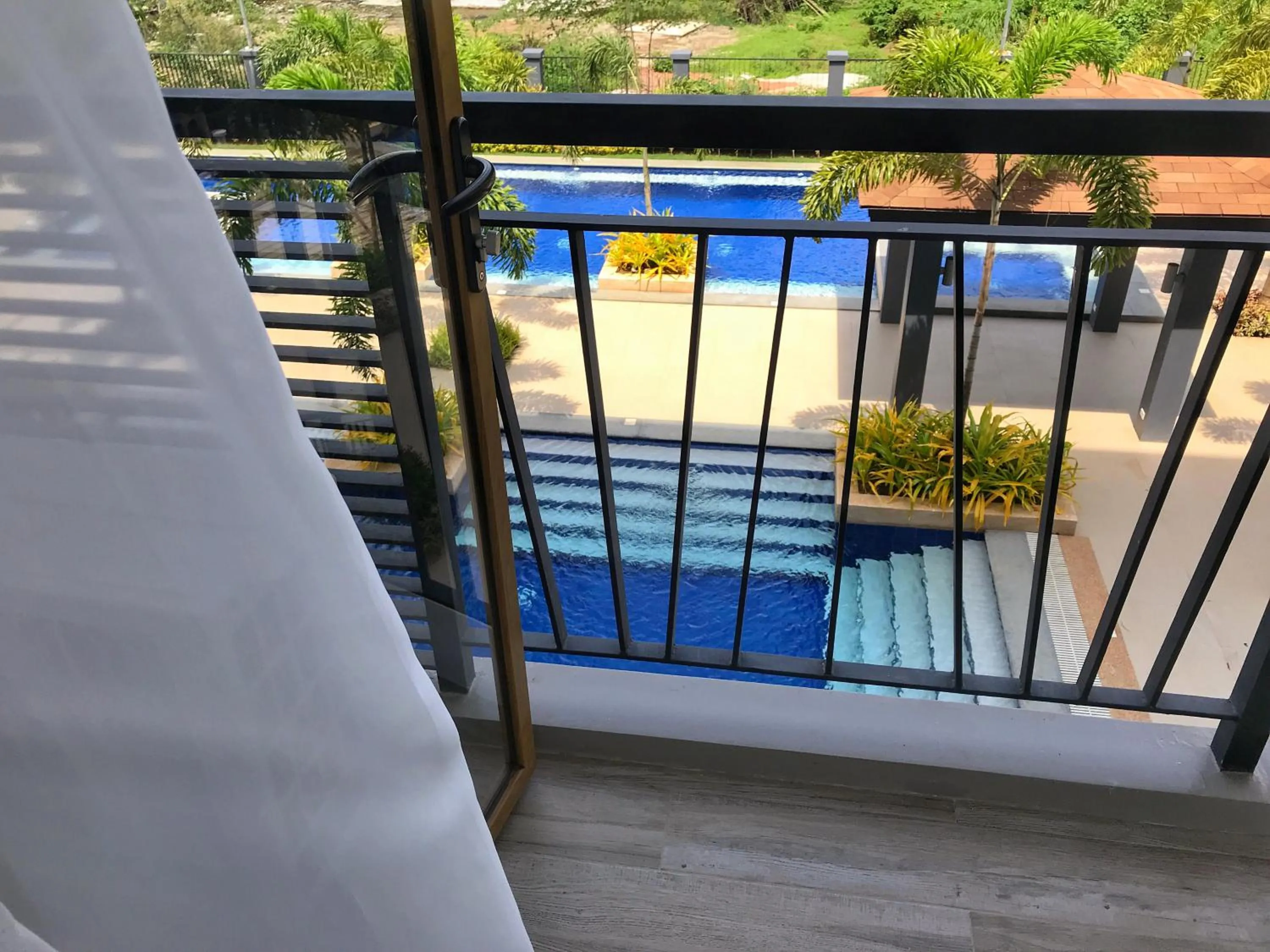 Pool view in Crown Hotel at Harbour Springs Palawan Managed by Enderun Hotels