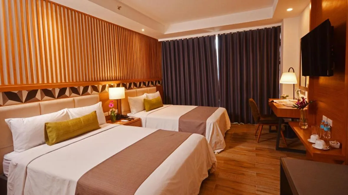 Photo of the whole room, Bed in Crown Hotel at Harbour Springs Palawan Managed by Enderun Hotels