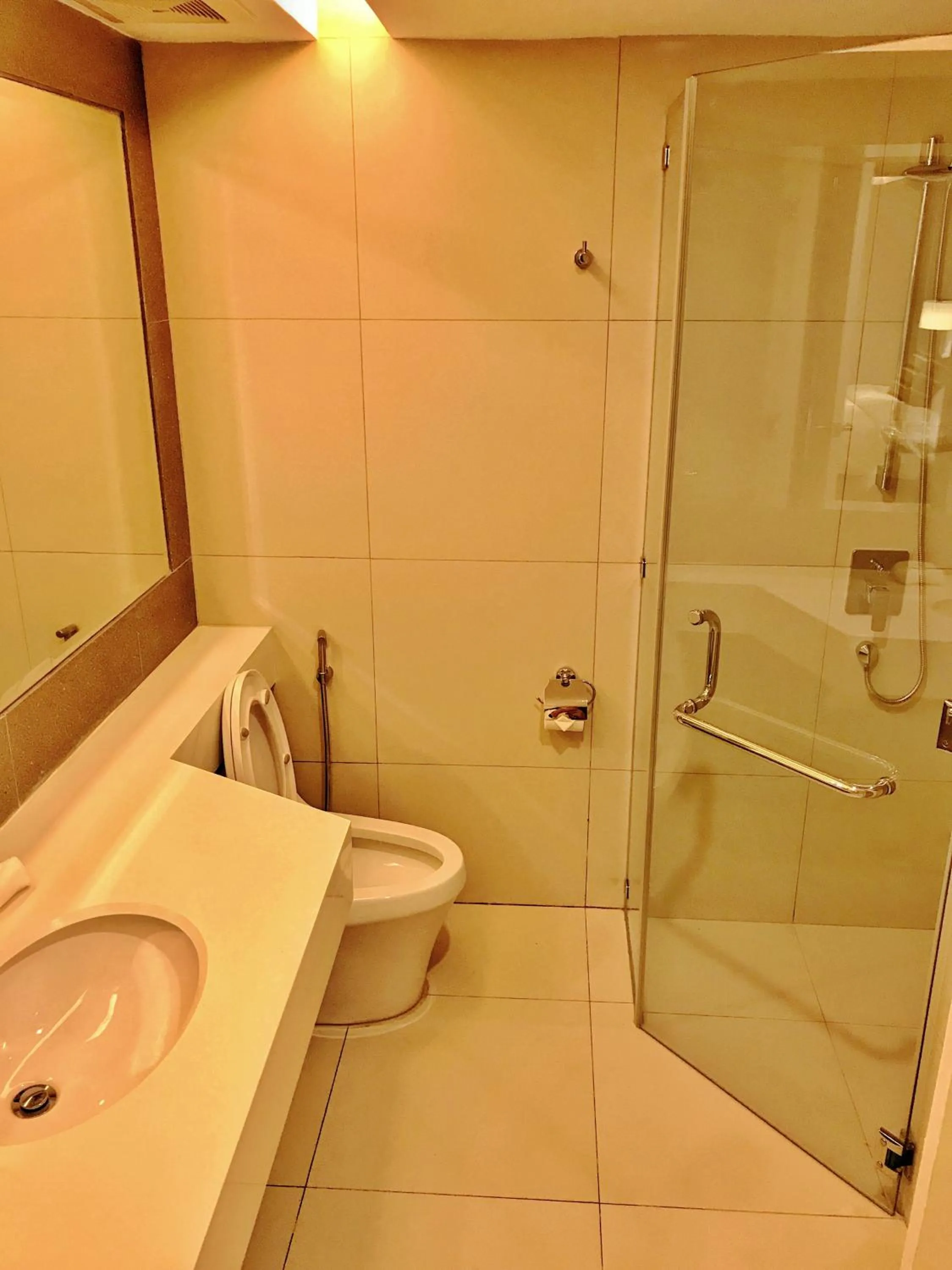Shower in Crown Hotel at Harbour Springs Palawan Managed by Enderun Hotels