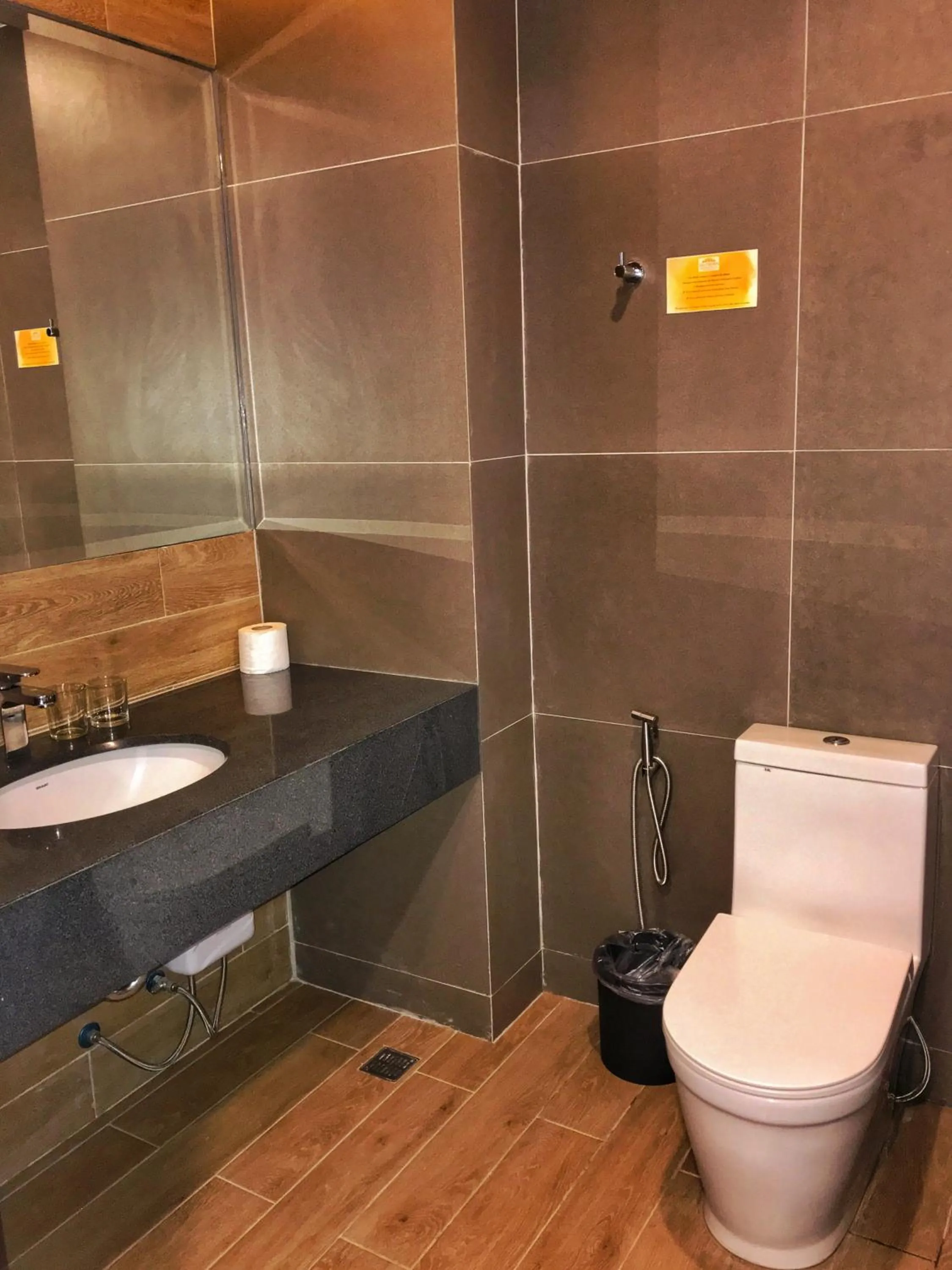 Toilet in Crown Hotel at Harbour Springs Palawan Managed by Enderun Hotels