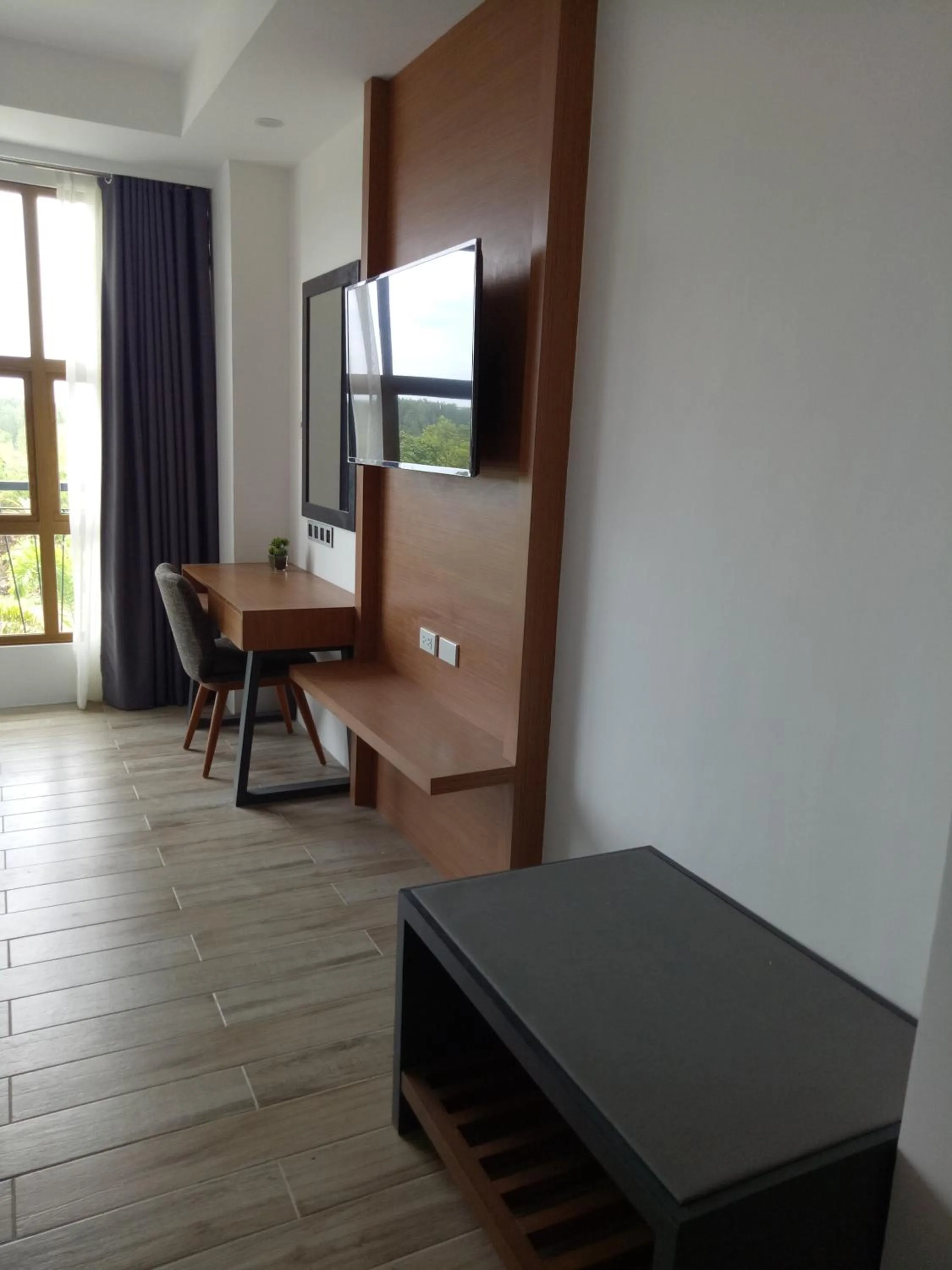 TV and multimedia in Crown Hotel at Harbour Springs Palawan Managed by Enderun Hotels