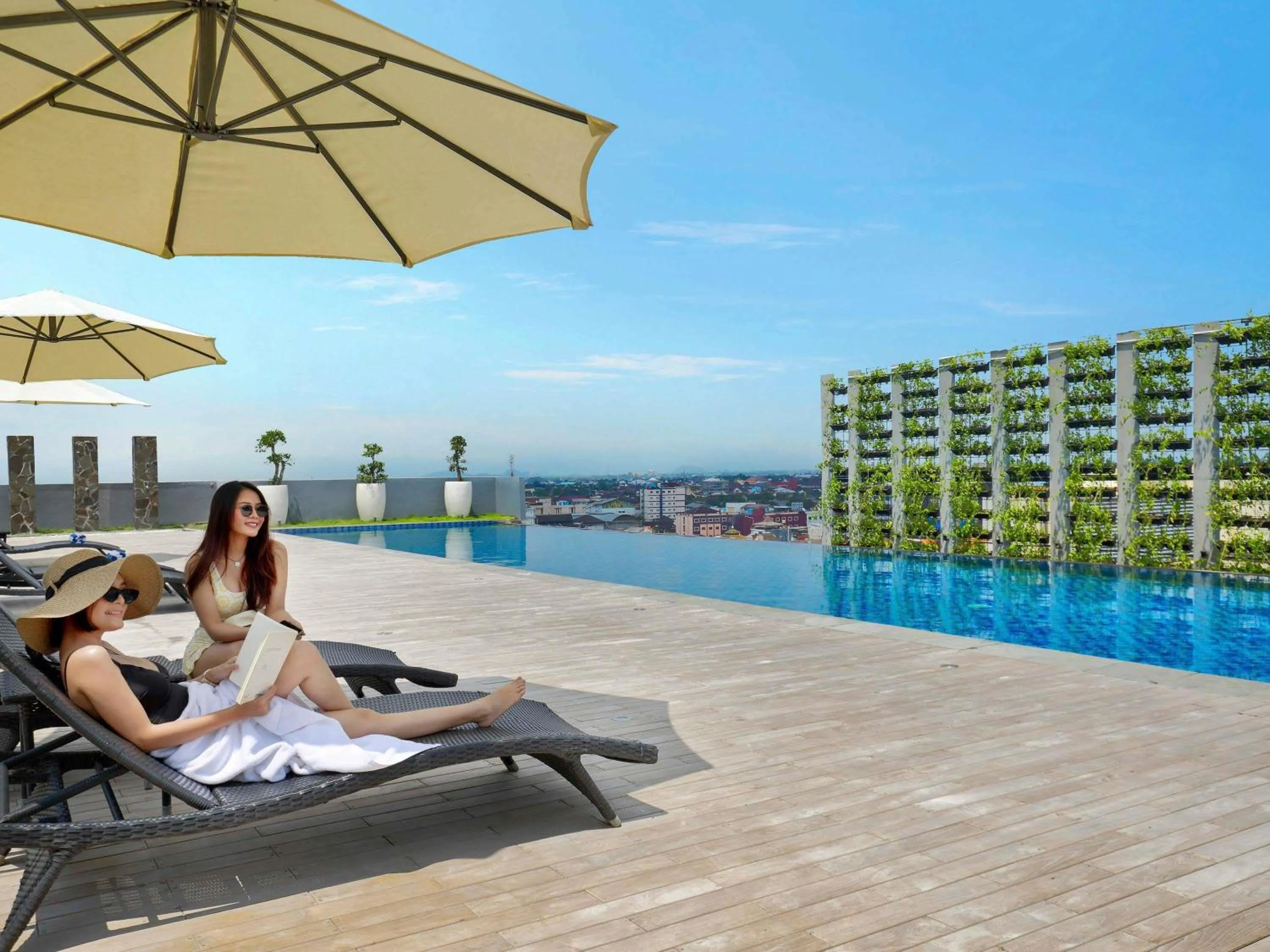 Pool view in Novotel Suites Yogyakarta Malioboro