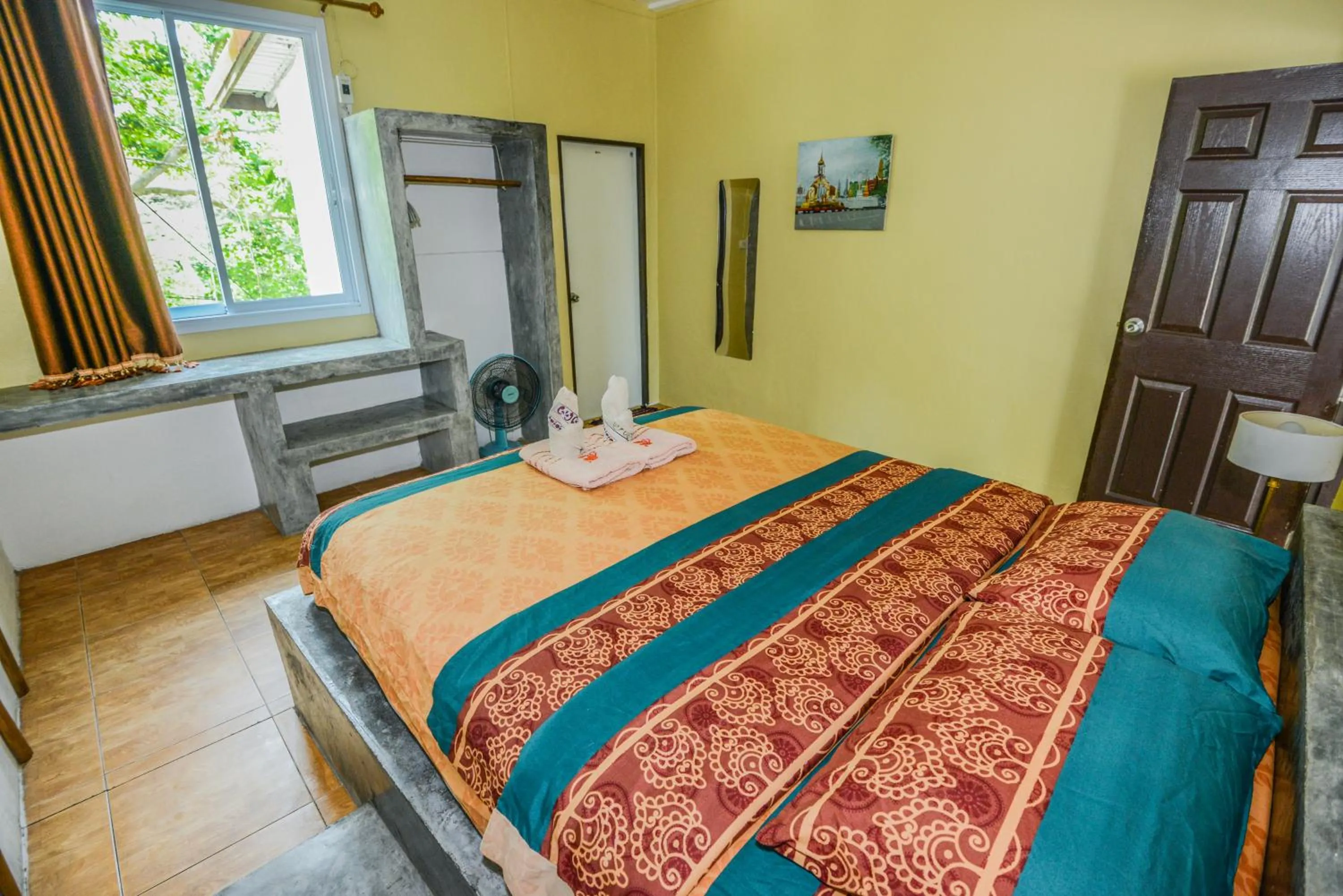 Bed in Sairee View Resort