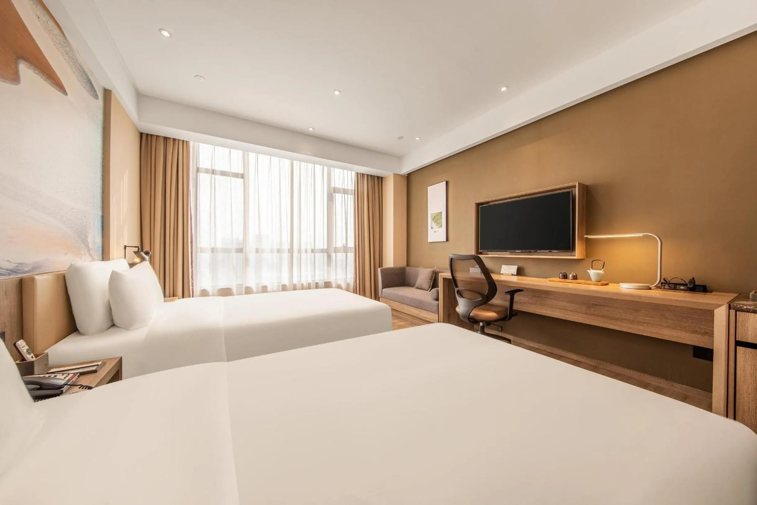 Bed in Atour Hotel High Speed Railway Station Maoming