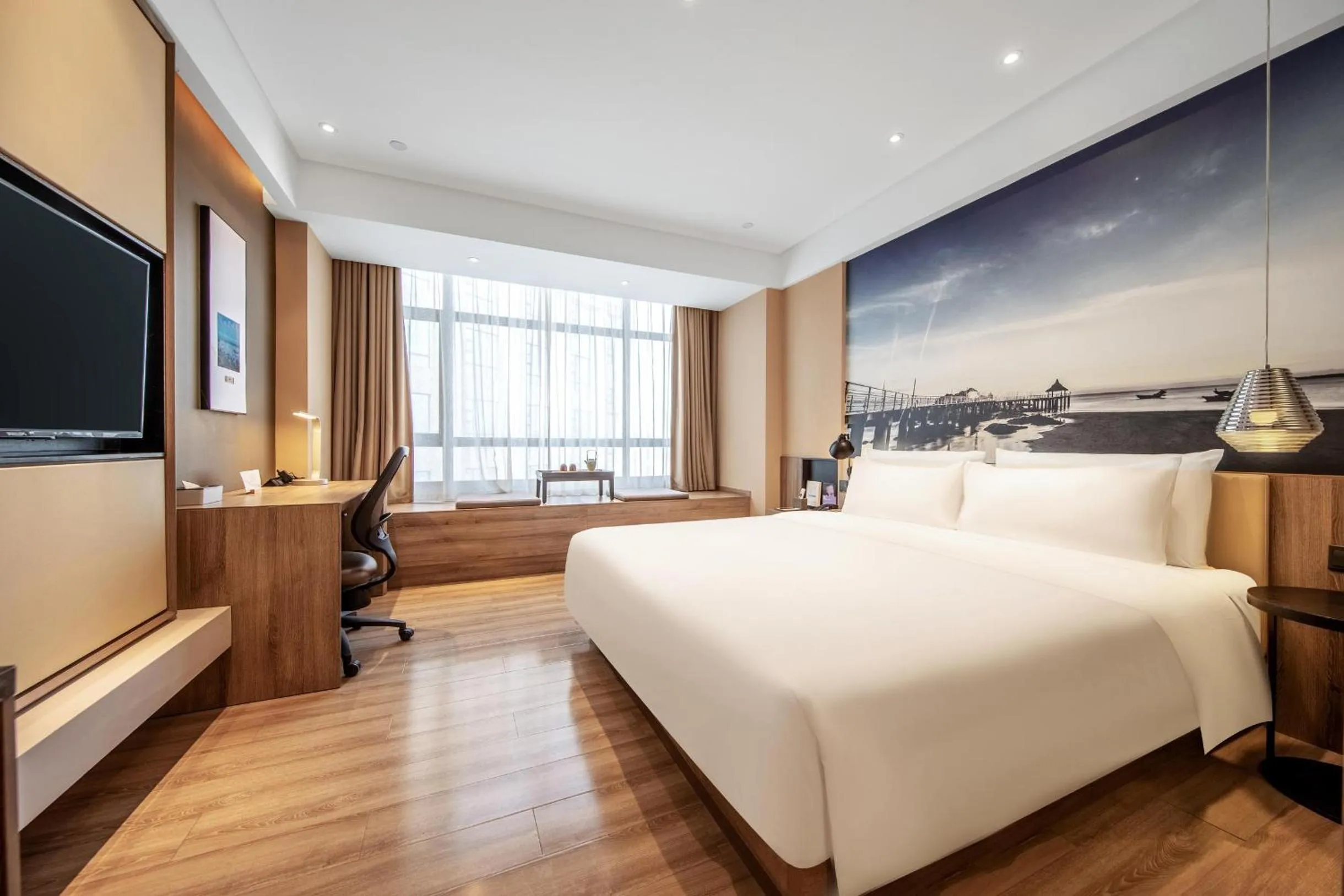 Bed in Atour Hotel High Speed Railway Station Maoming