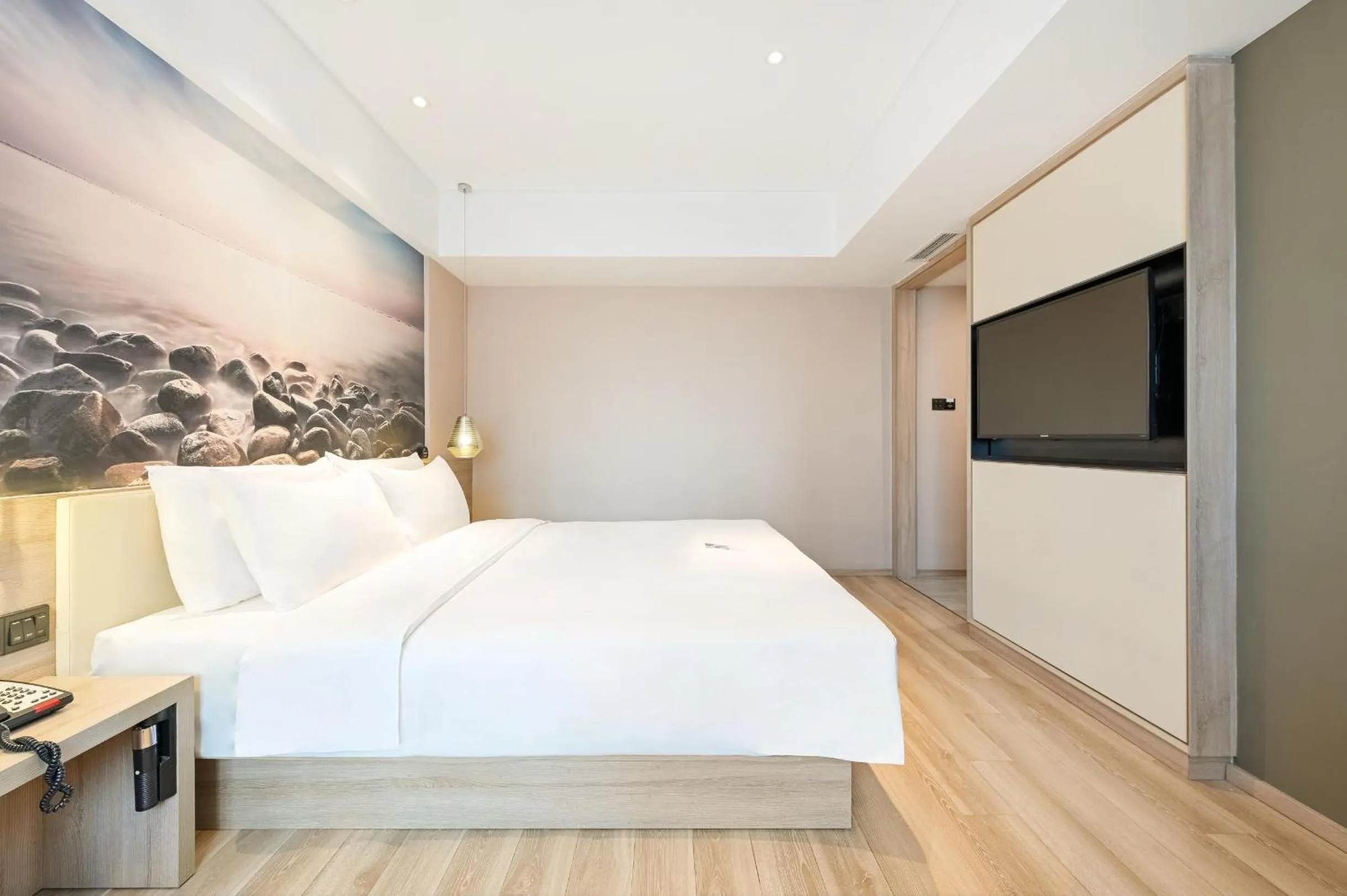 Bed in Atour Hotel Railway Station Dalian