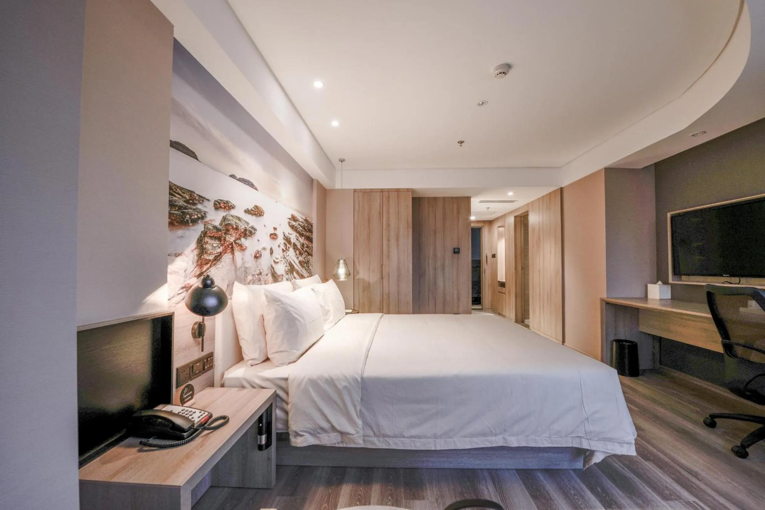 Bed in Atour Hotel Railway Station Dalian