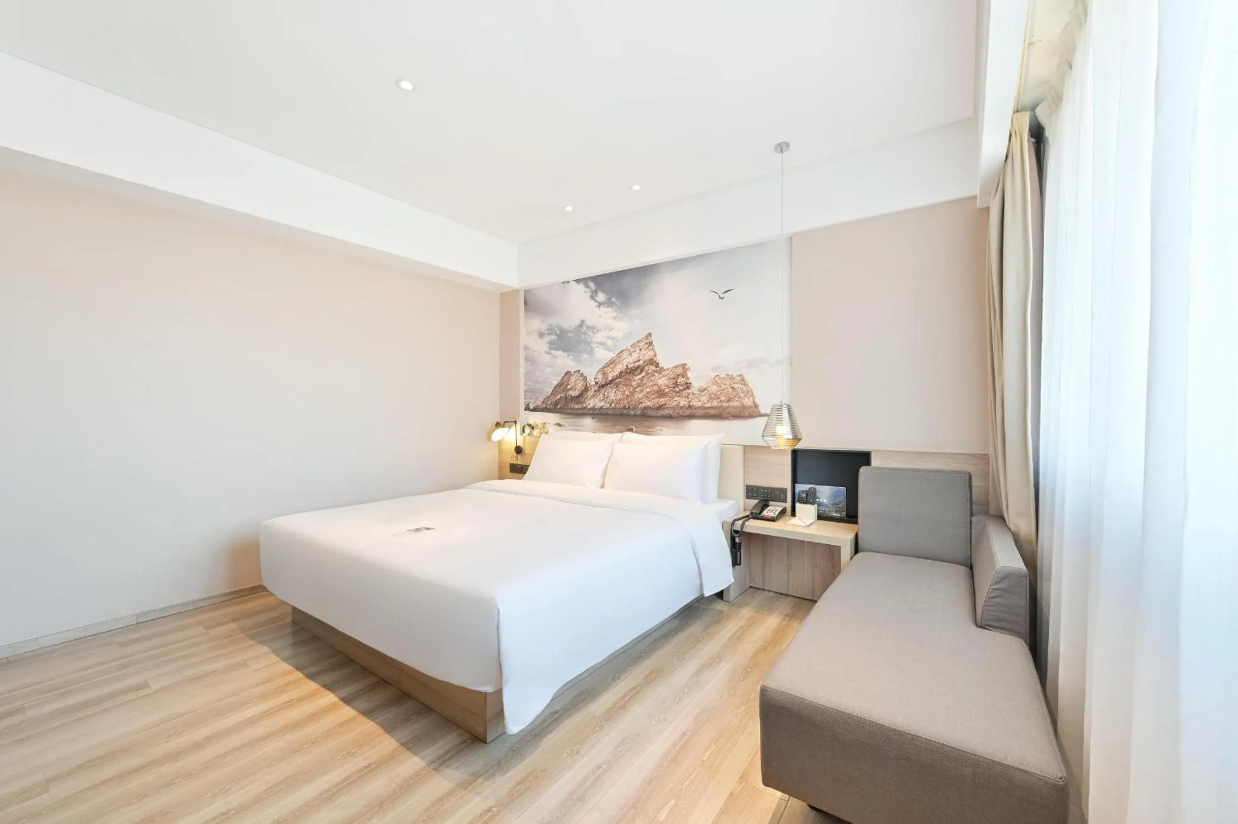 Bed in Atour Hotel Railway Station Dalian