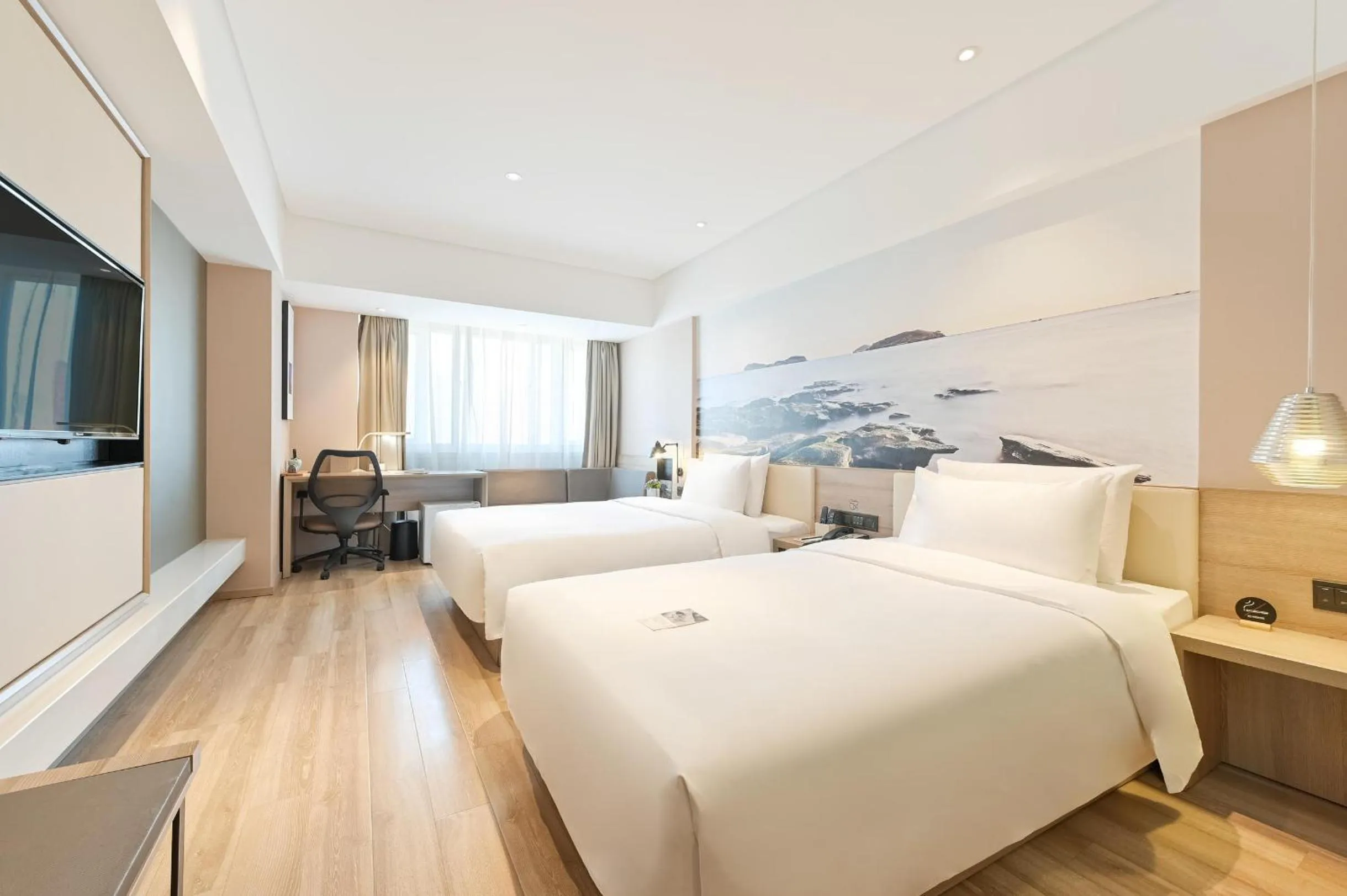 Bed in Atour Hotel Railway Station Dalian