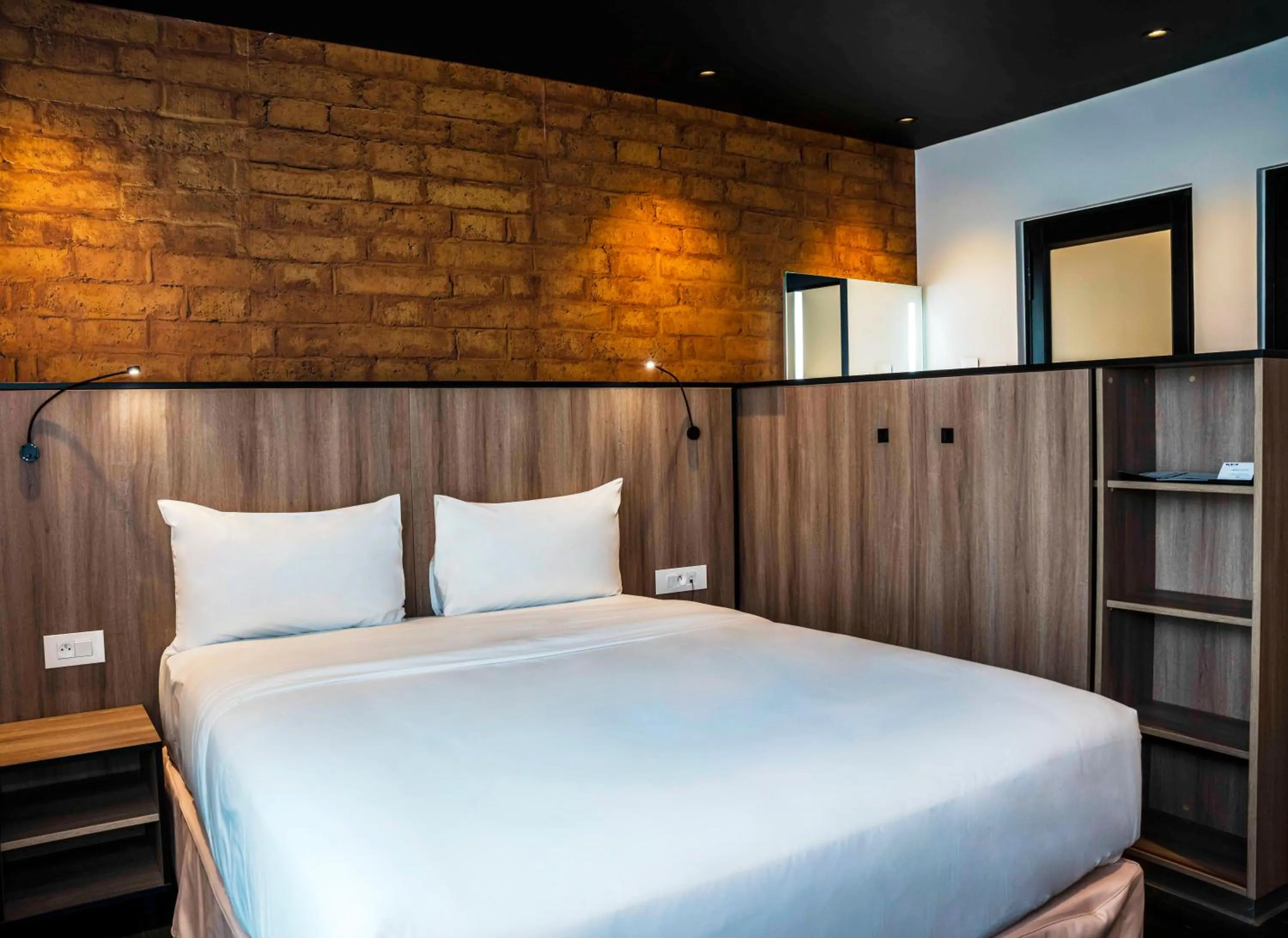 Bed in ONOMO Hotel Douala