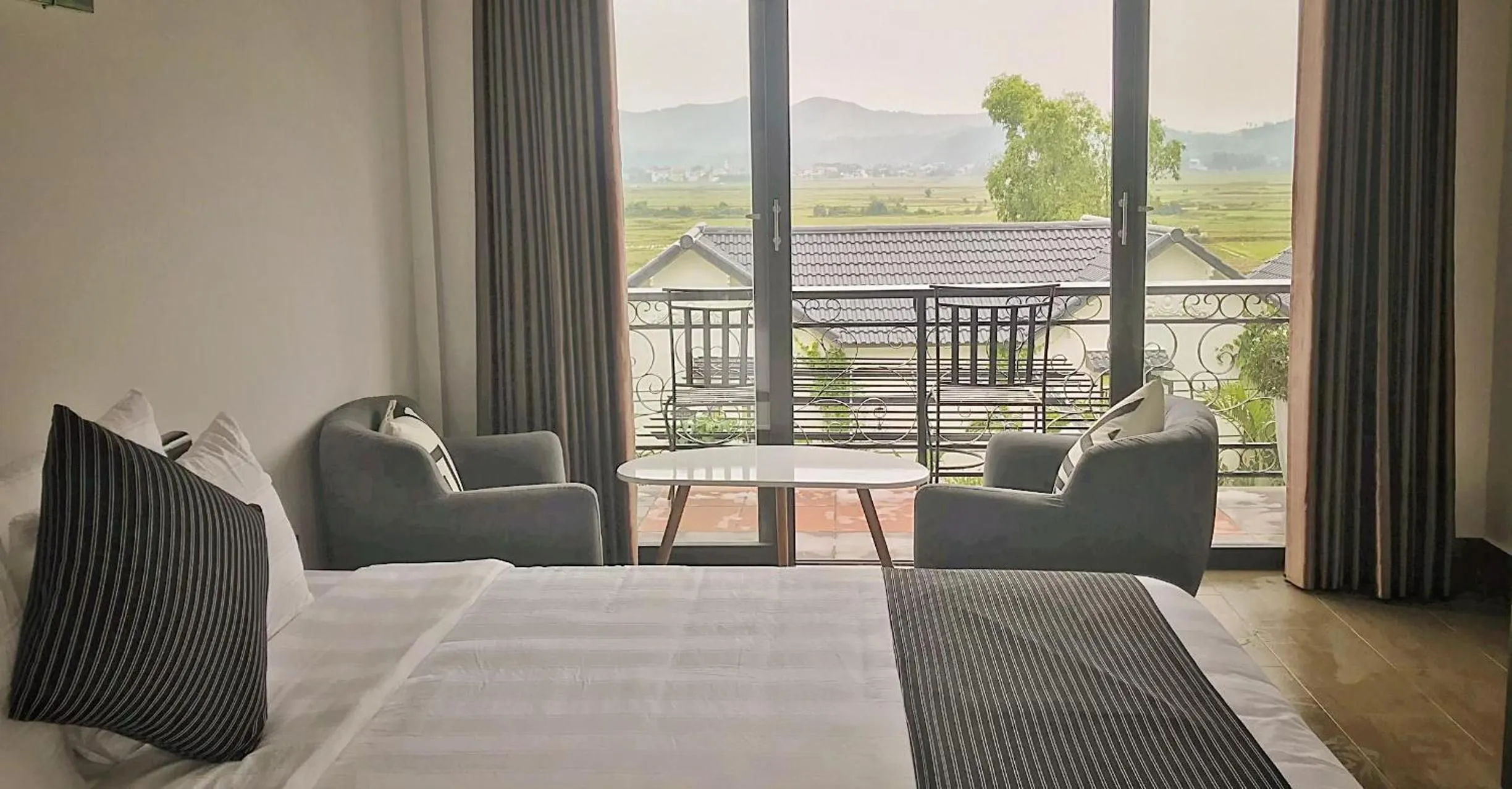 Seating area, Bed in Karst Villas Phong Nha