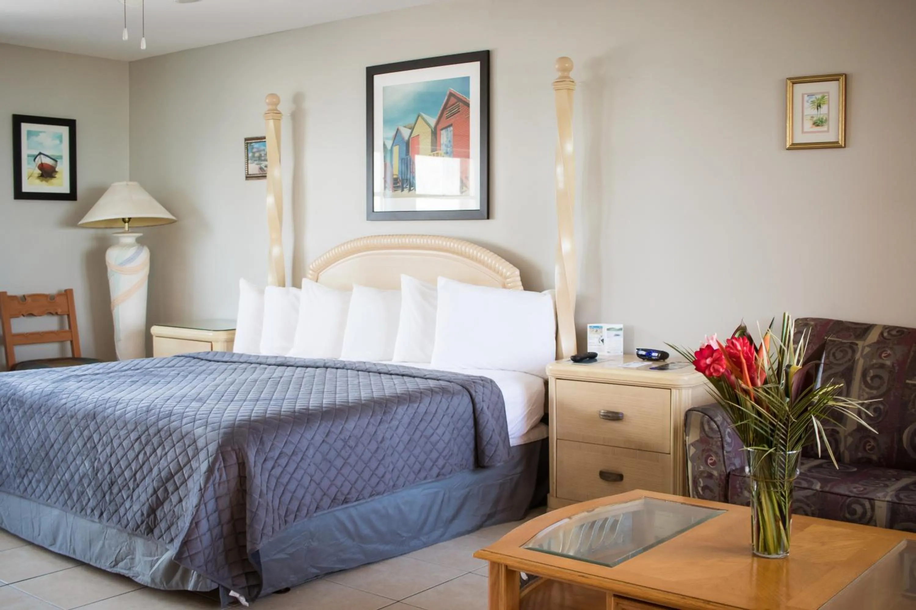 Bed in Riptide Oceanfront Hotel