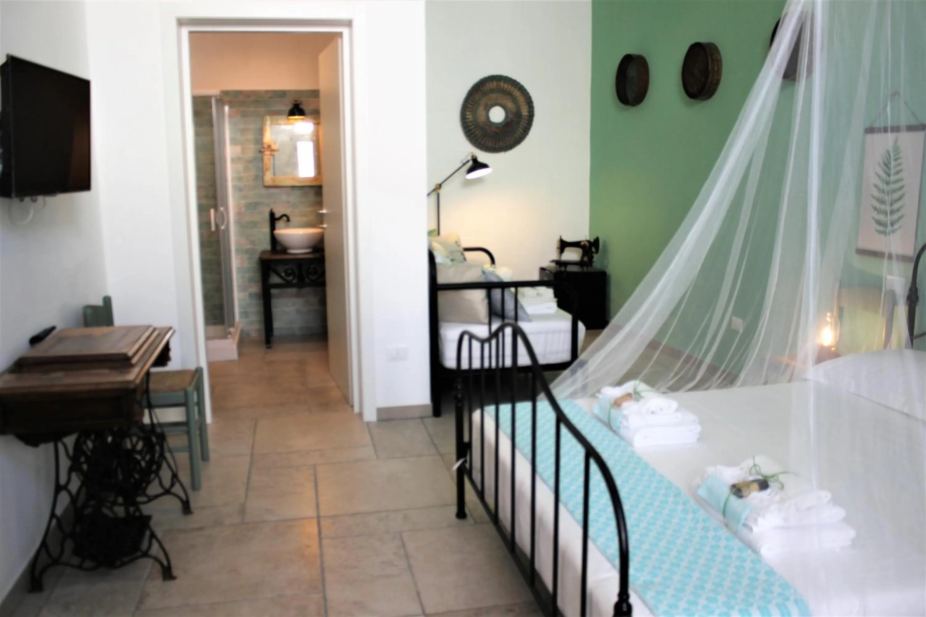 Bed in Li Perrini Boutique B&B