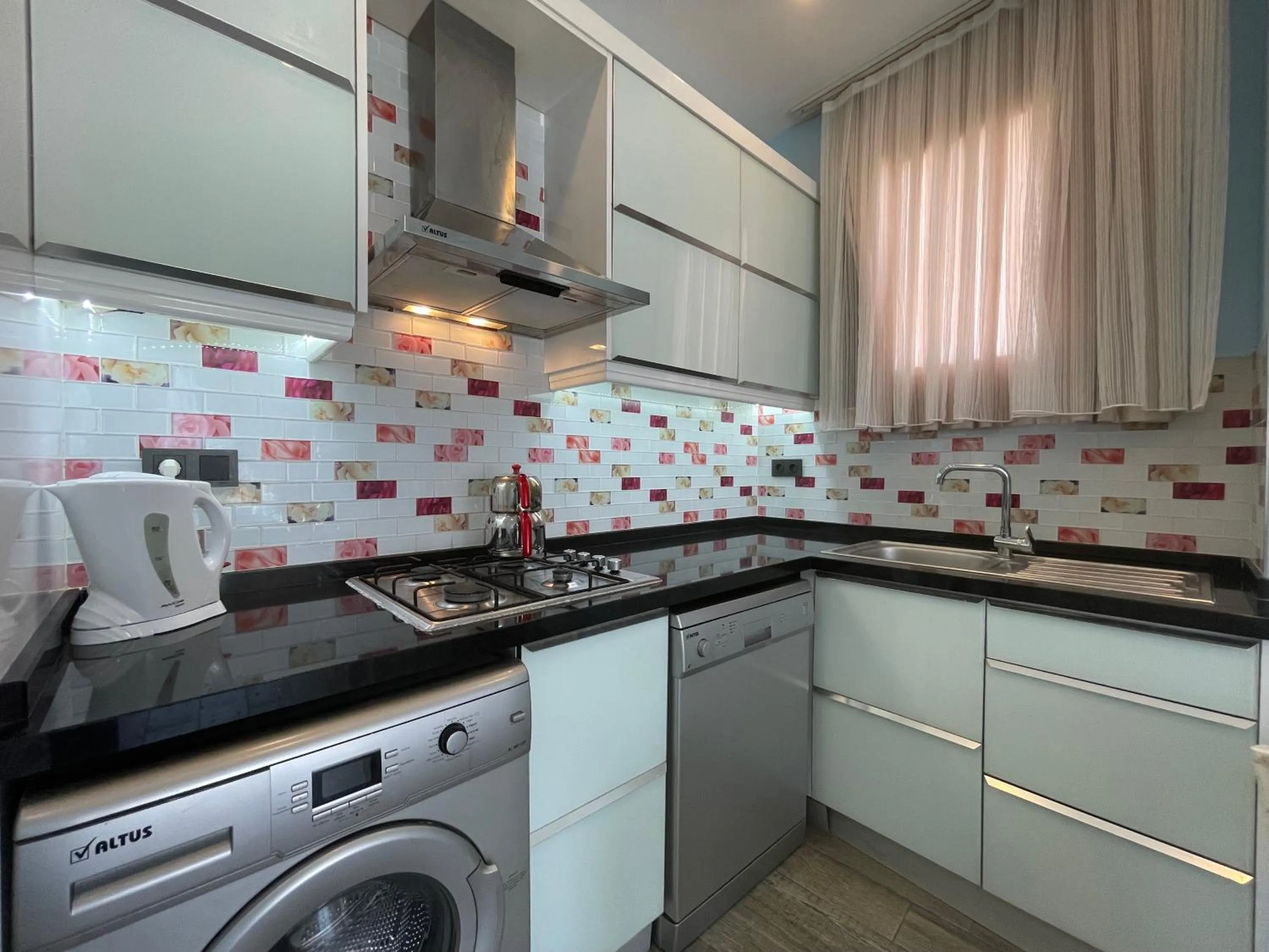 Kitchen or kitchenette in X SUITE APART