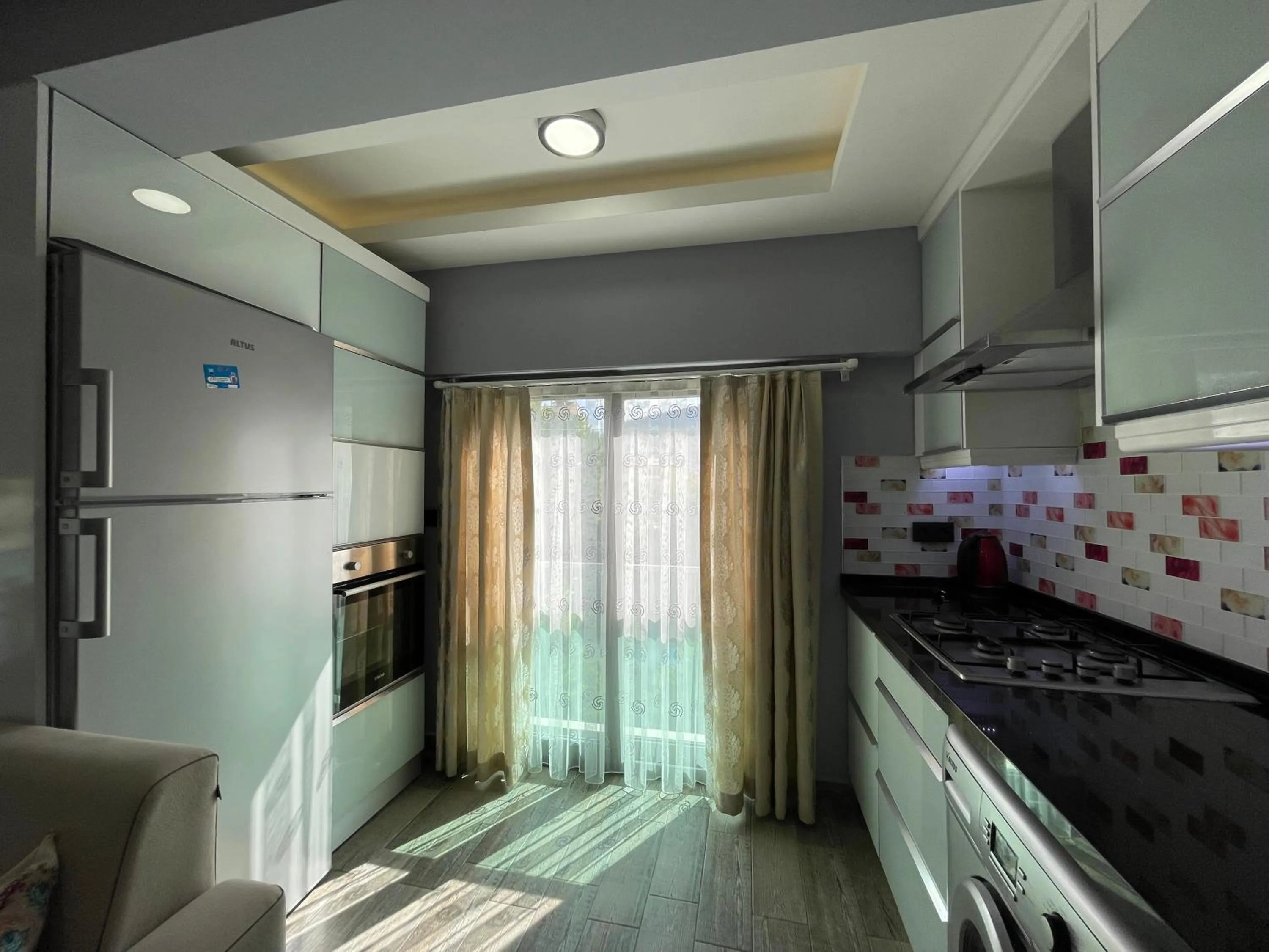 Kitchen or kitchenette in X SUITE APART