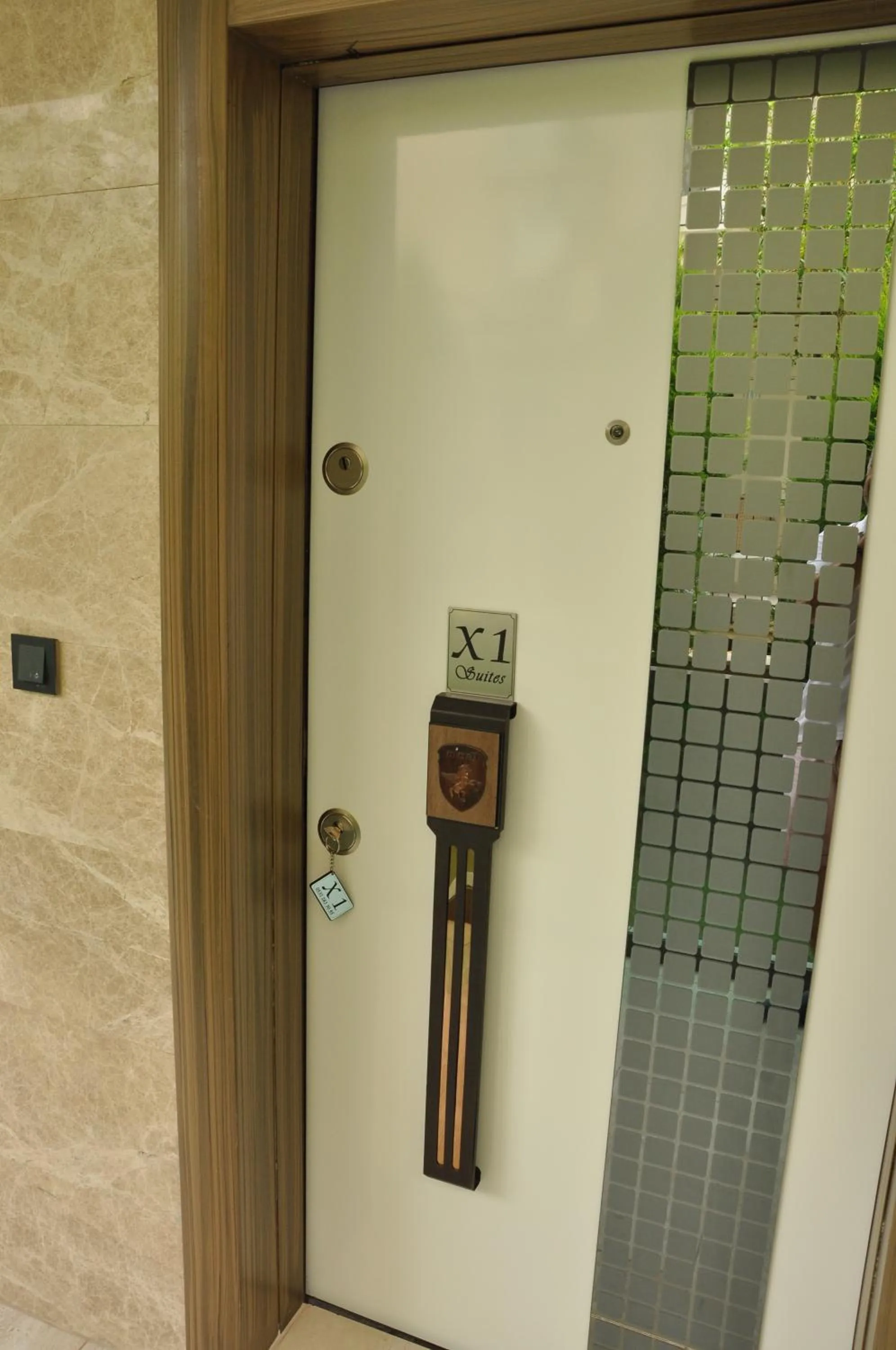 Facade/entrance in X SUITE APART