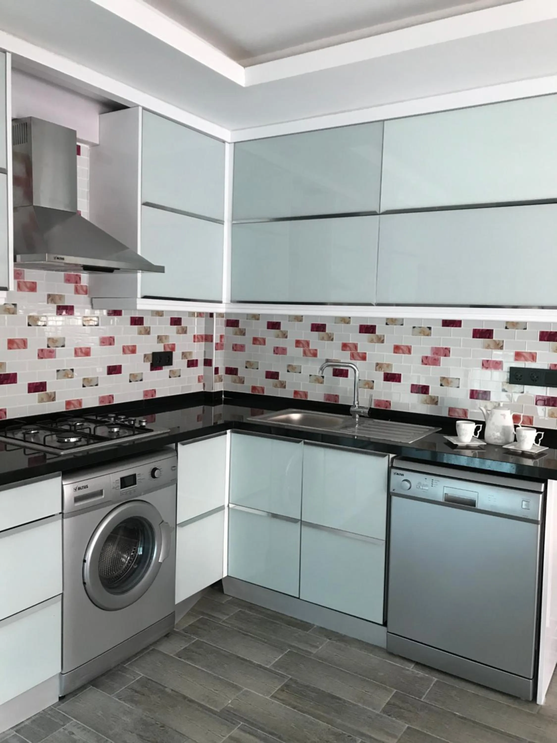 Kitchen or kitchenette in X SUITE APART