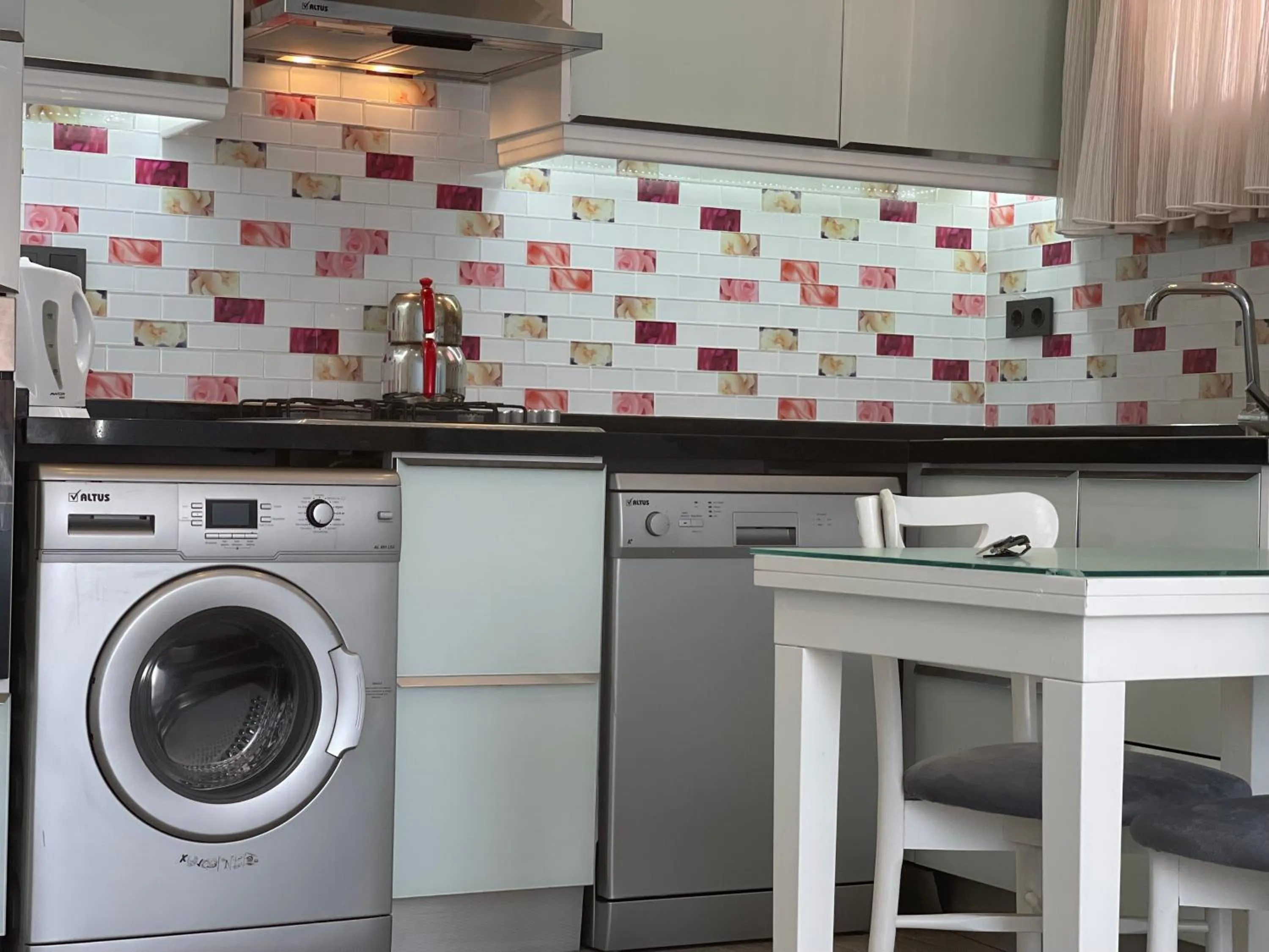 Kitchen or kitchenette in X SUITE APART