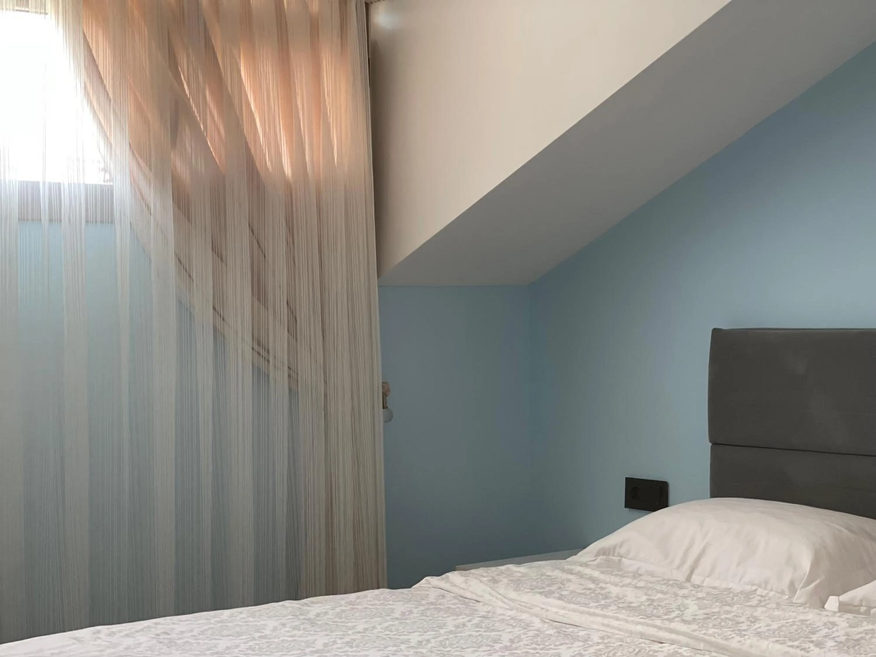 Bed in X SUITE APART