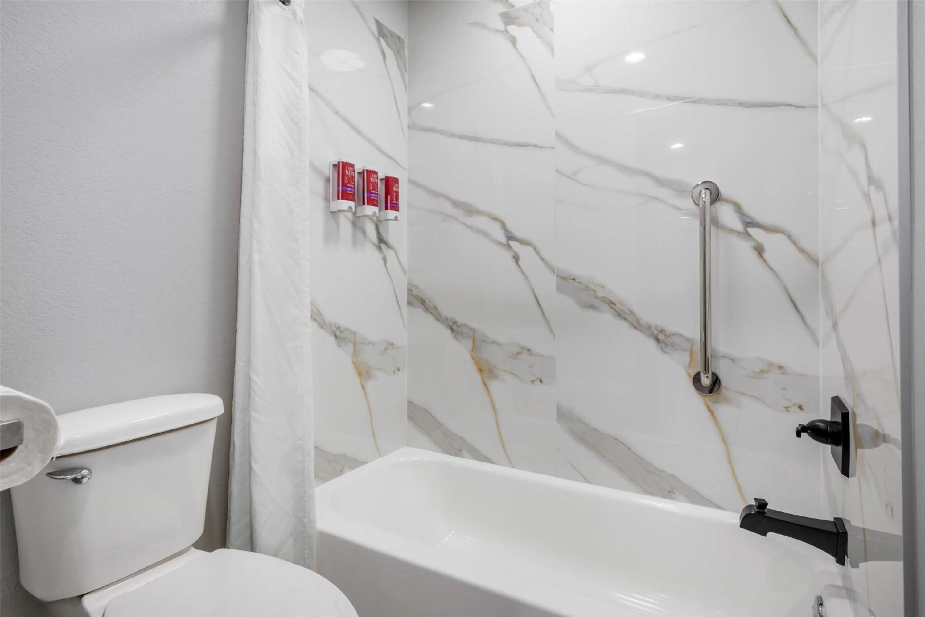 Bathroom in SureStay by Best Western McAlester