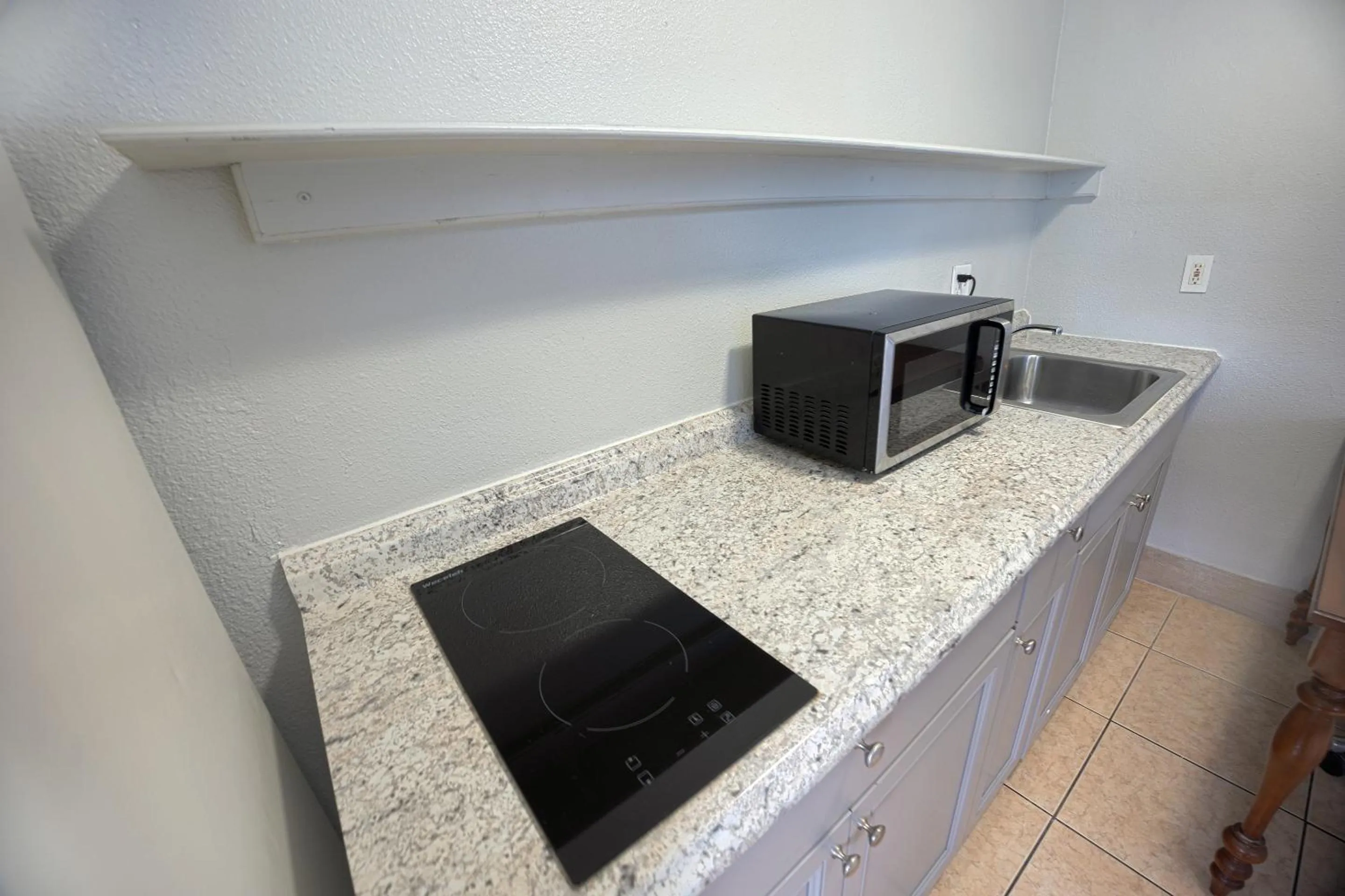 Bedroom in Aladdin Motel By OYO Merritt Island