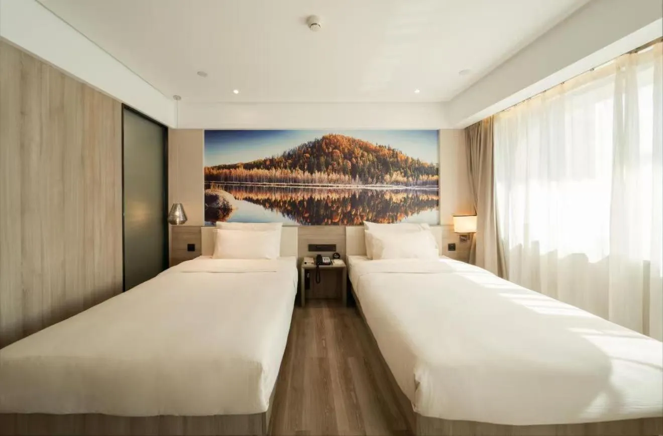 Bed in Atour Harbin Museum Hotel