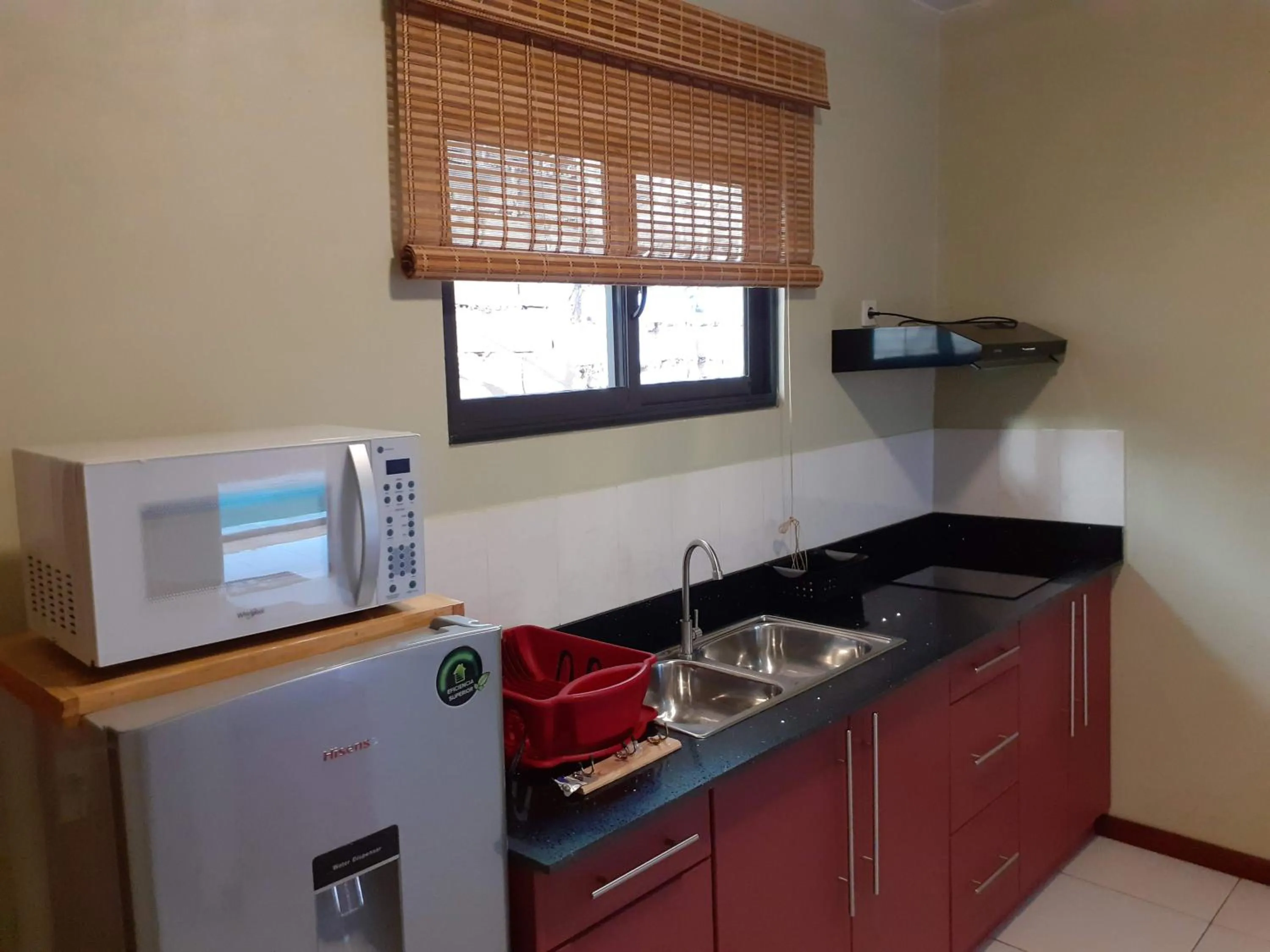 Kitchen or kitchenette in Max Garden and Pool