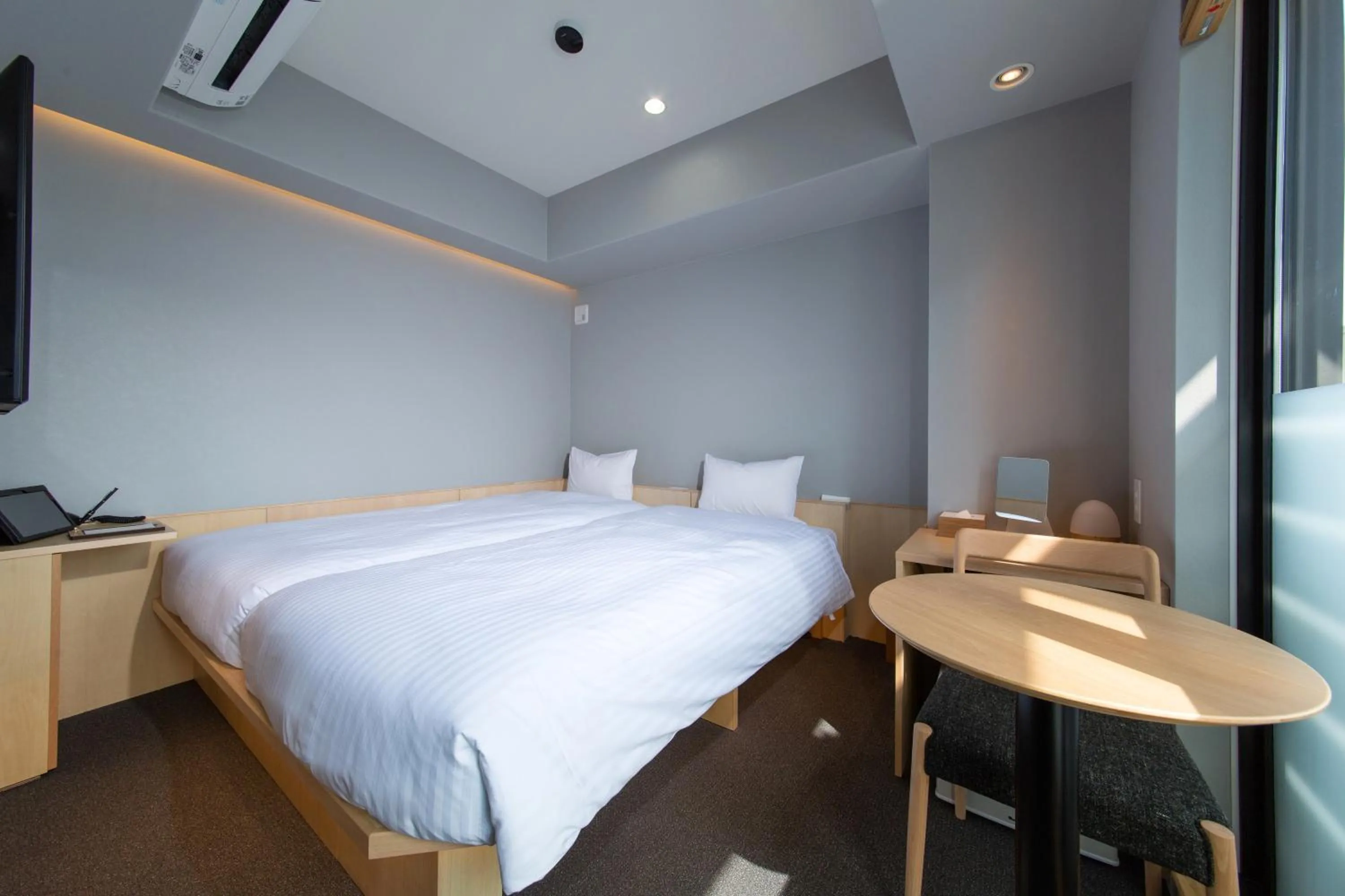 Photo of the whole room, Bed in HOTEL AMANEK Kyoto Kawaramachi Gojo