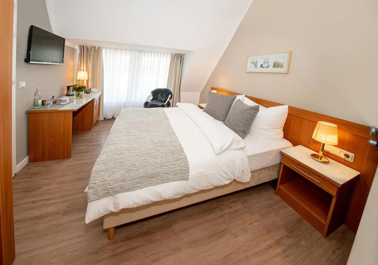 Bed in Gästehaus fliegendes Perlhuhn Borgfeld