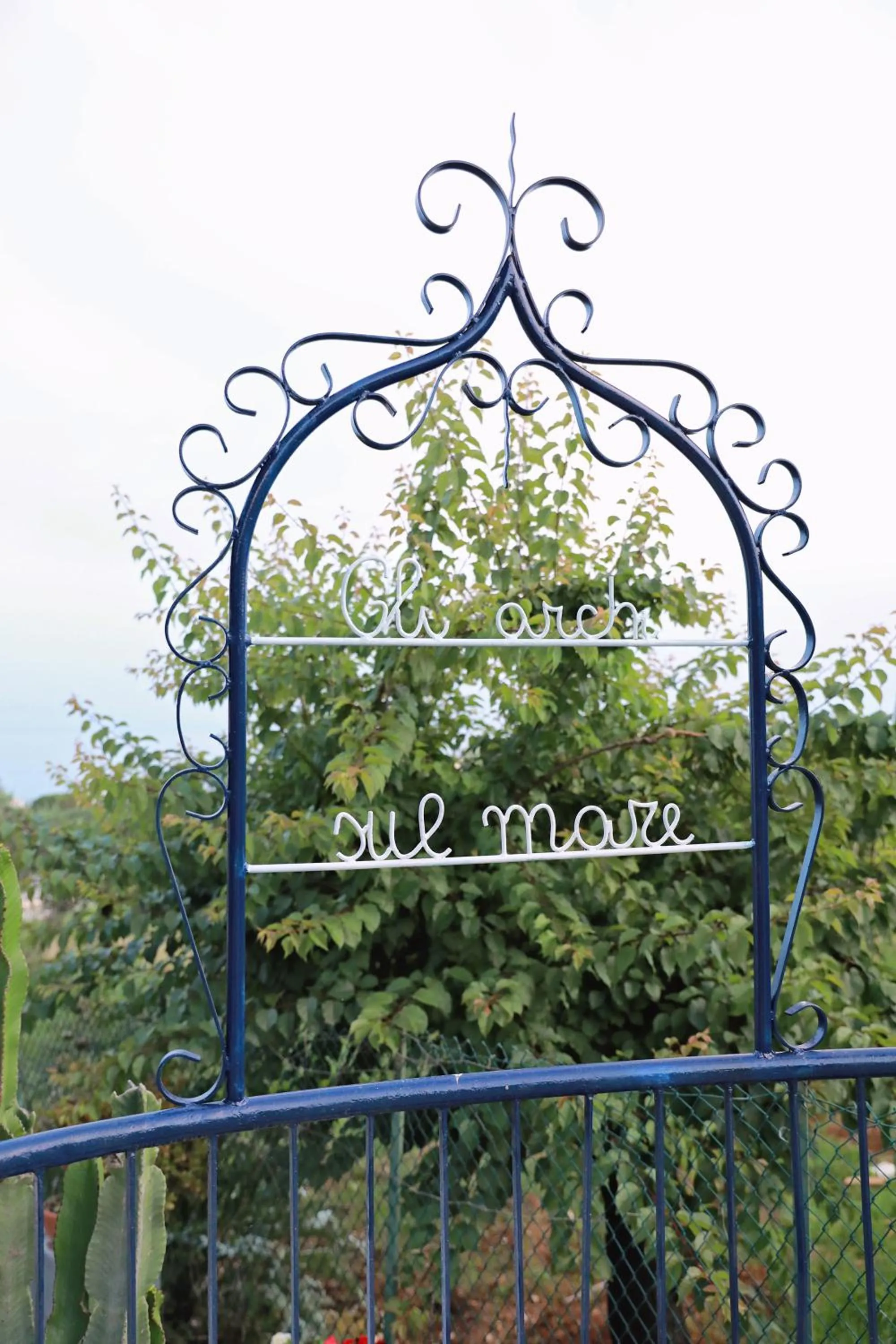 Property logo or sign in Gli archi sul mare