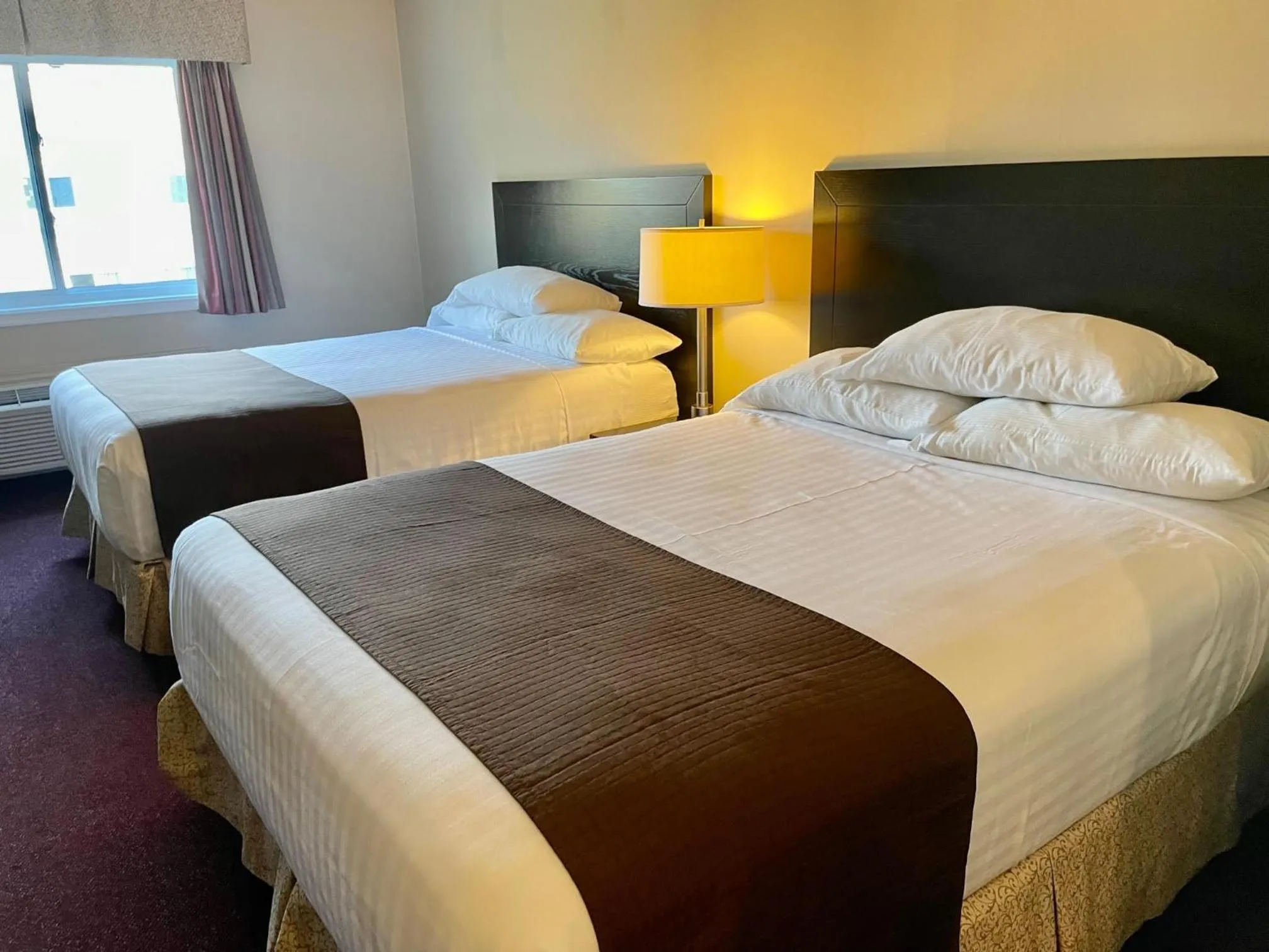 Bed in Atlantic Host Hotel, Trademark Collection by Wyndham