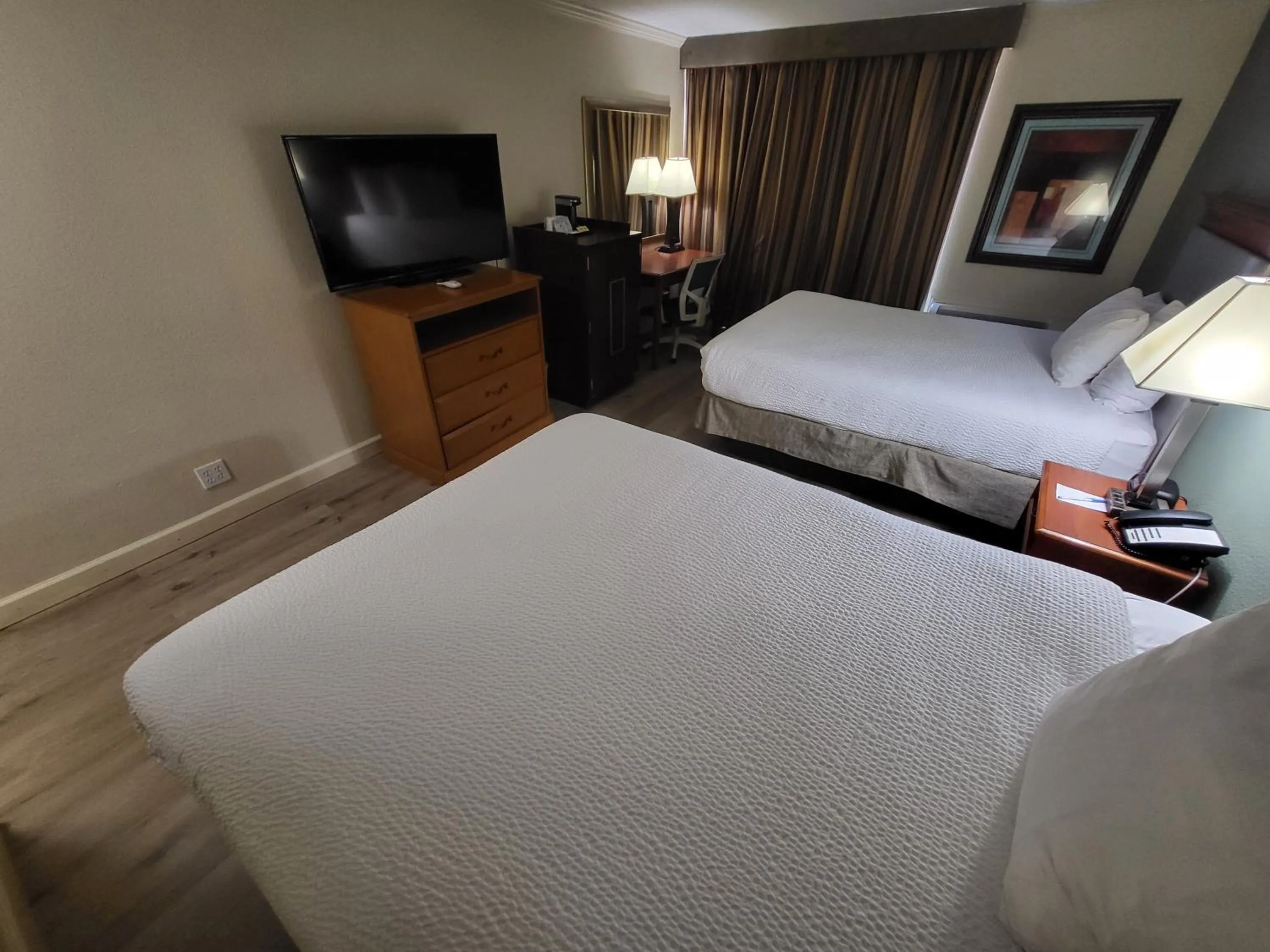 Bed in Ramada by Wyndham Houston Intercontinental Airport East